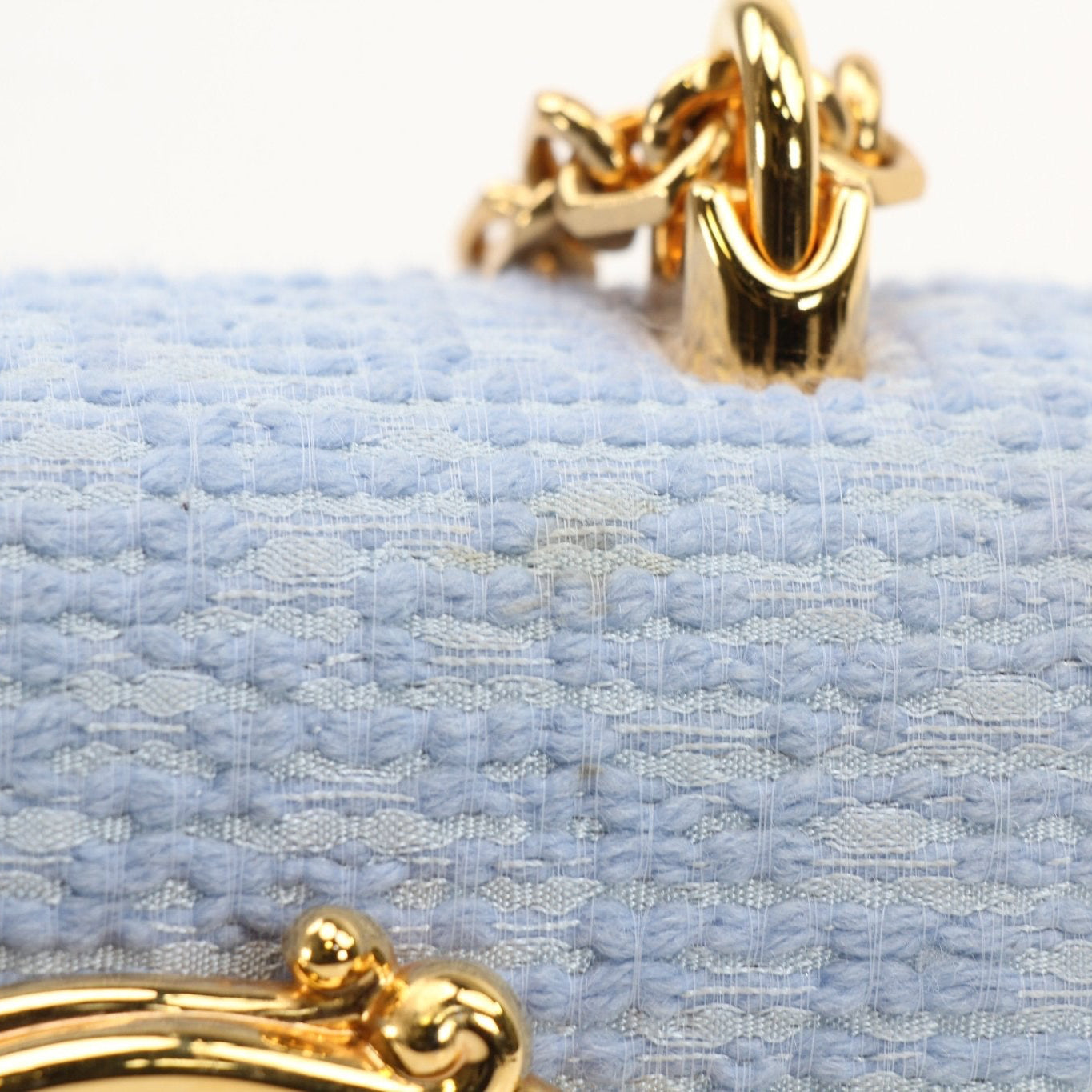 Light blue Dolce Gabbana DG Girl shoulder handbag with tweed fabric and gold accents, stylish and elegant for everyday wear.