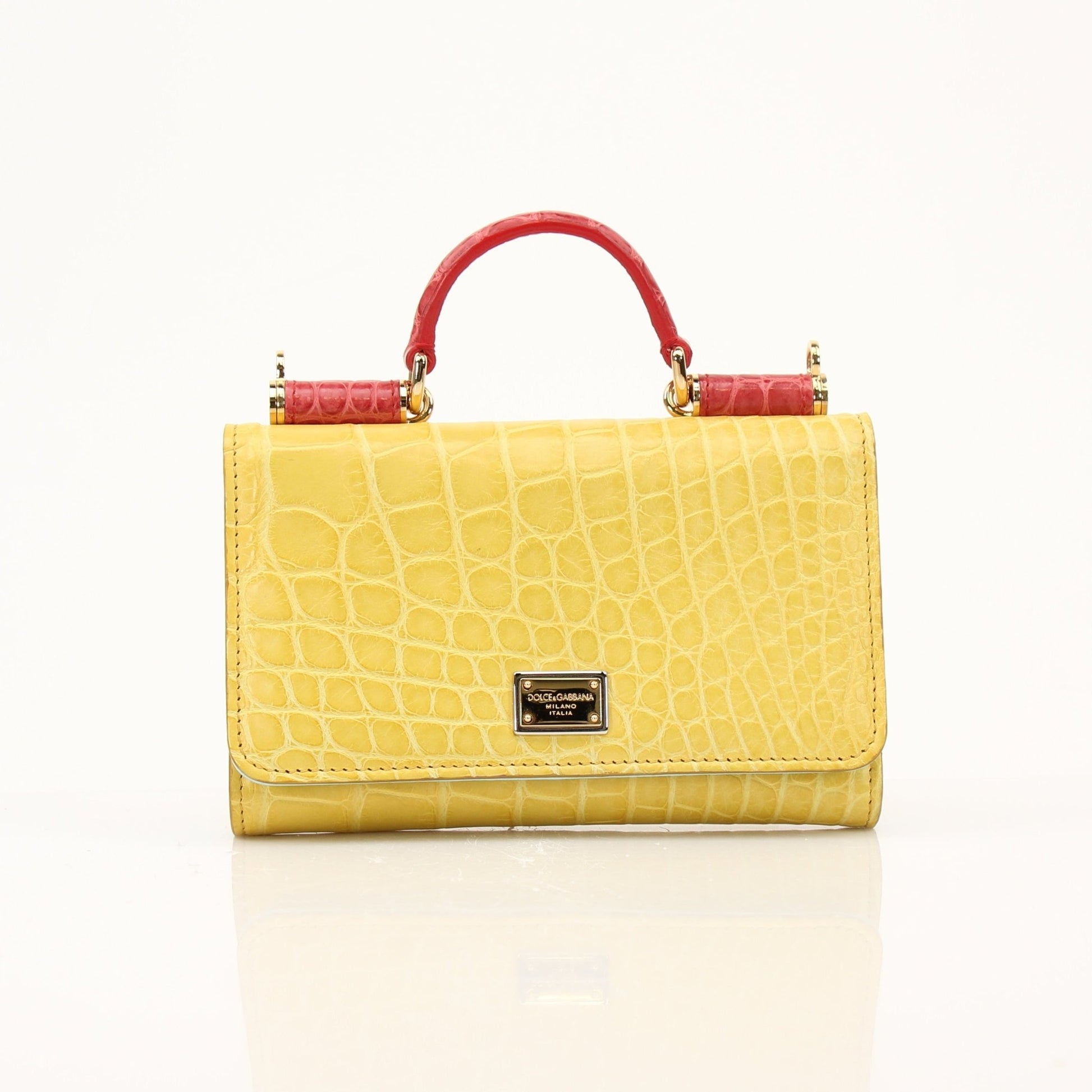 Yellow leather Dolce & Gabbana Von Mini Sicily handbag with gold hardware, featuring a compact, stylish design.