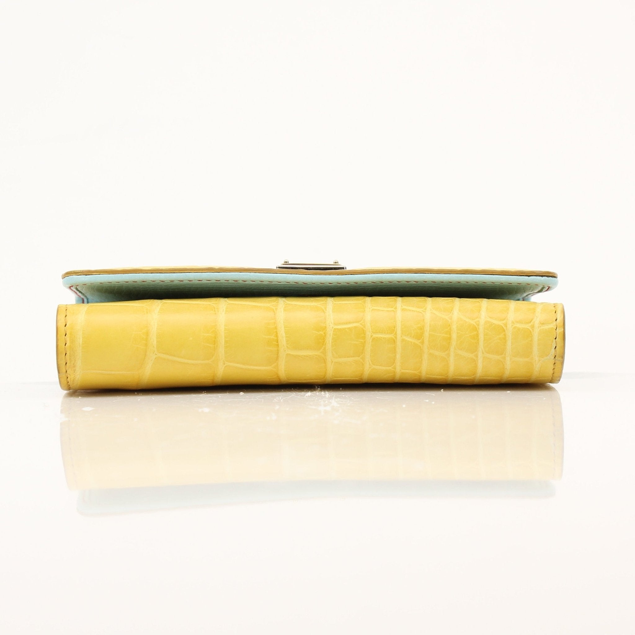 Yellow leather Dolce & Gabbana Von Mini Sicily handbag with gold hardware, showcasing a compact, stylish handbag design.