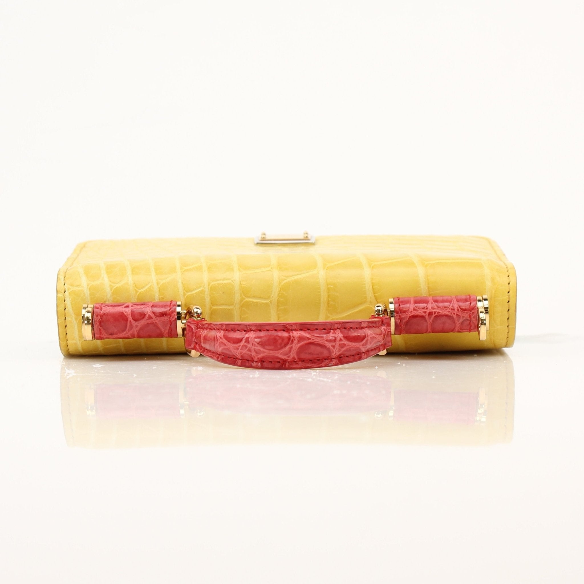 Dolce & Gabbana Von Mini Sicily yellow leather handbag with gold hardware and structured design.