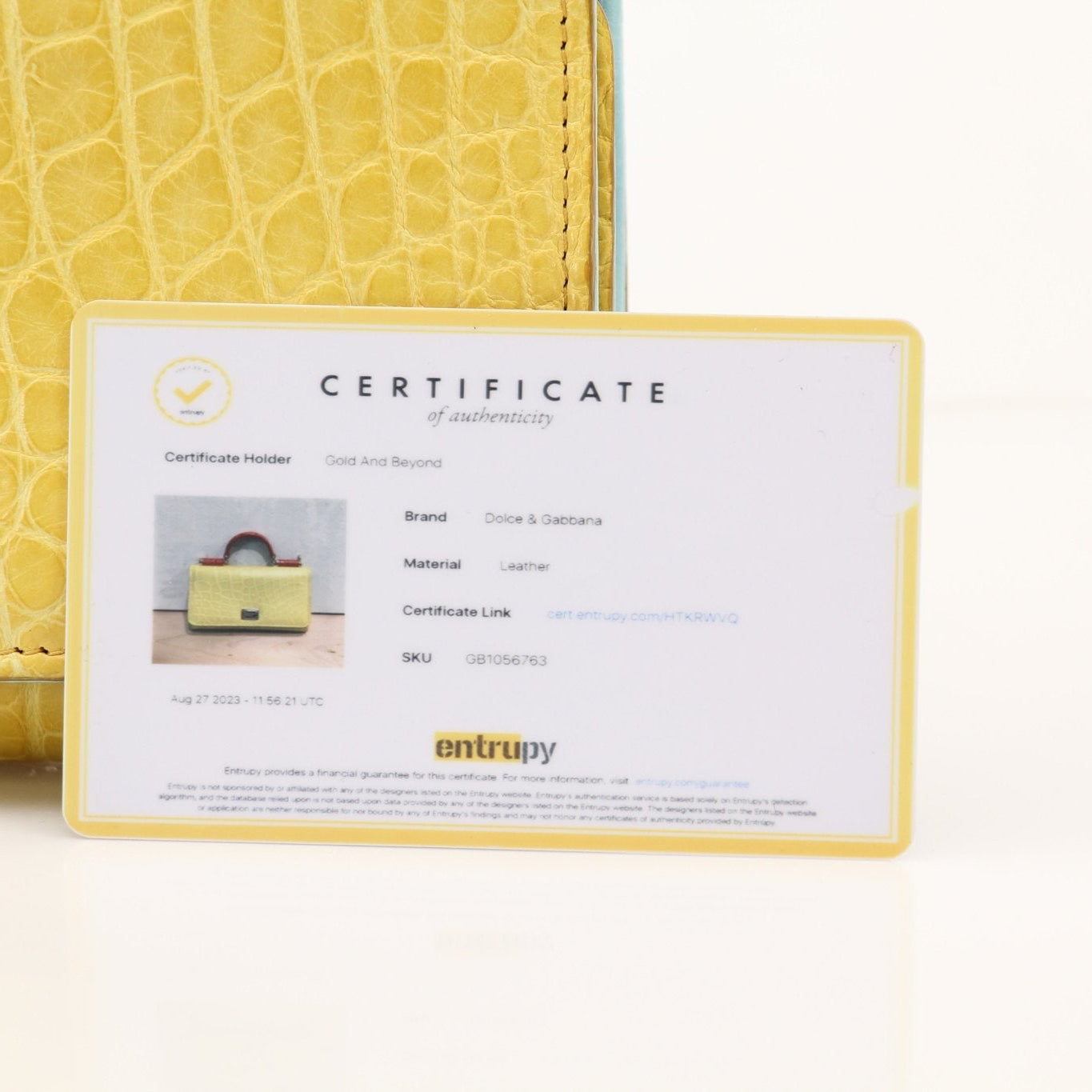 Yellow leather Dolce & Gabbana Von Mini Sicily handbag with gold-tone hardware and structured design.