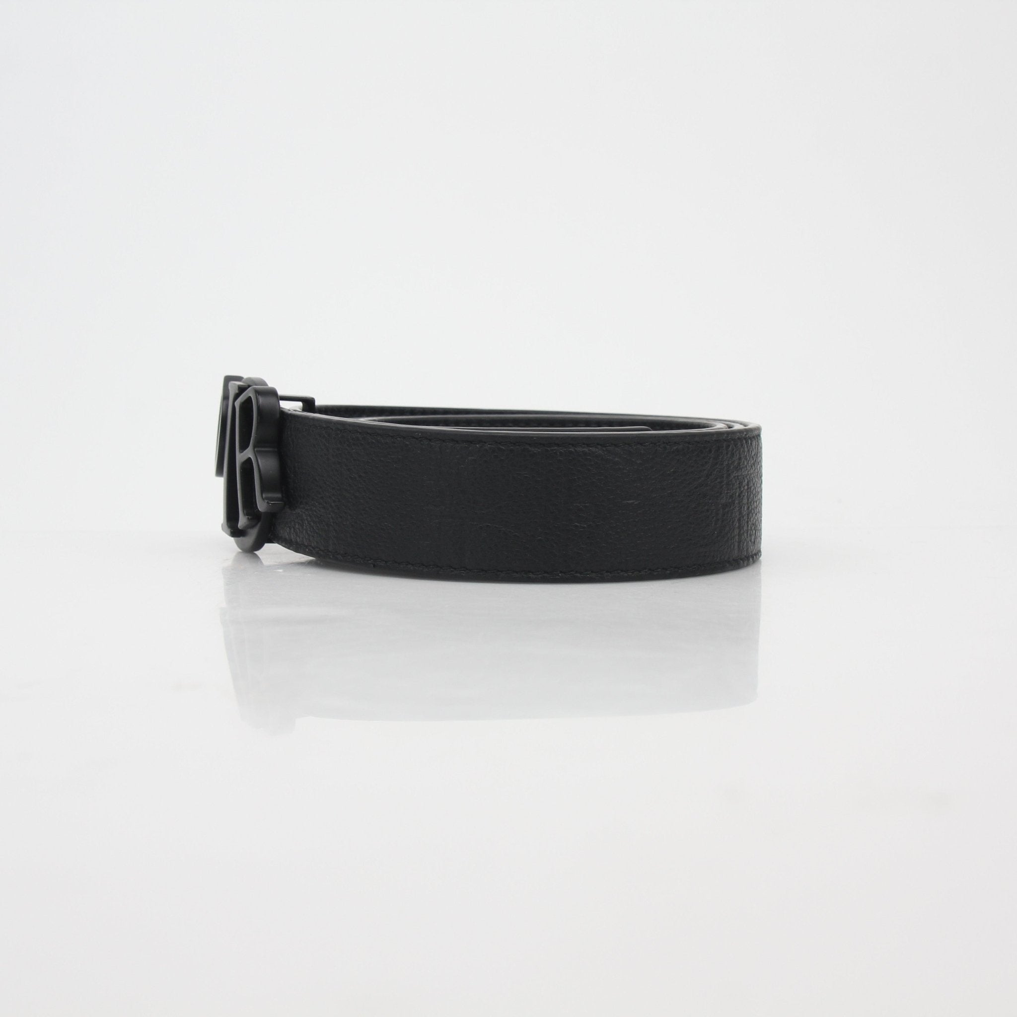 Black leather Dior Signature buckle belt with gold accents, featured in accessories by Christian Dior.