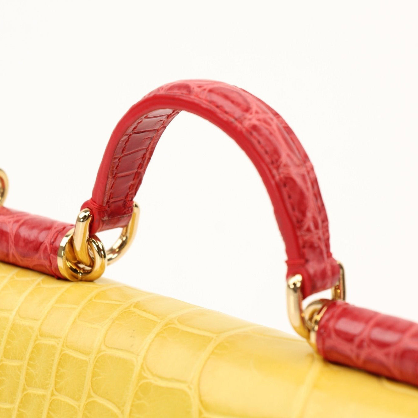 Yellow leather Dolce & Gabbana Von Mini Sicily handbag with gold accents, featuring a structured shape and top handle.