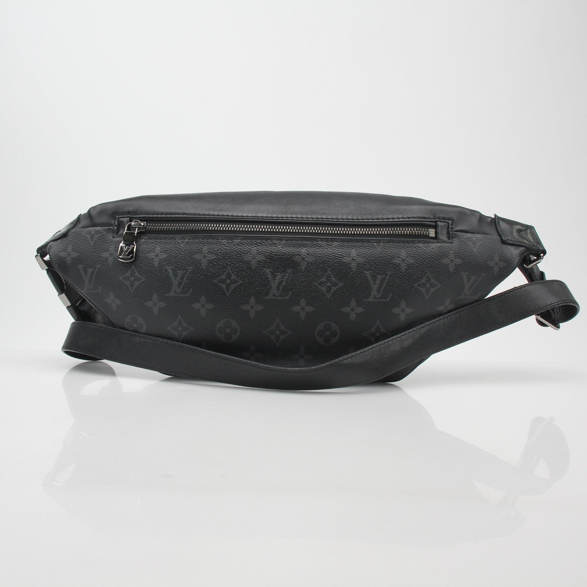 Louis Vuitton Black Monogram Eclipse Discovery Bum Bag PM handbag with adjustable strap and gold-tone hardware.