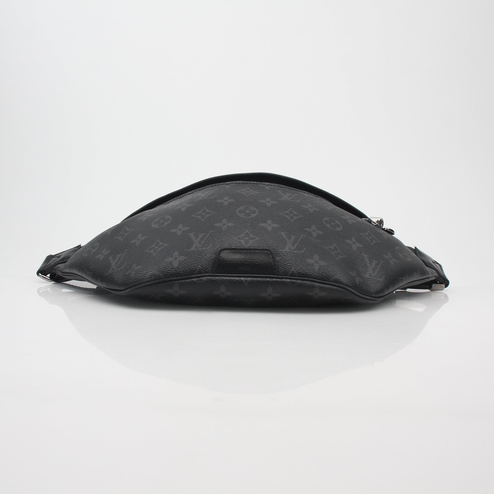 Louis Vuitton Black Monogram Eclipse Discovery Bum Bag PM, a stylish handbag with monogram design and adjustable strap.