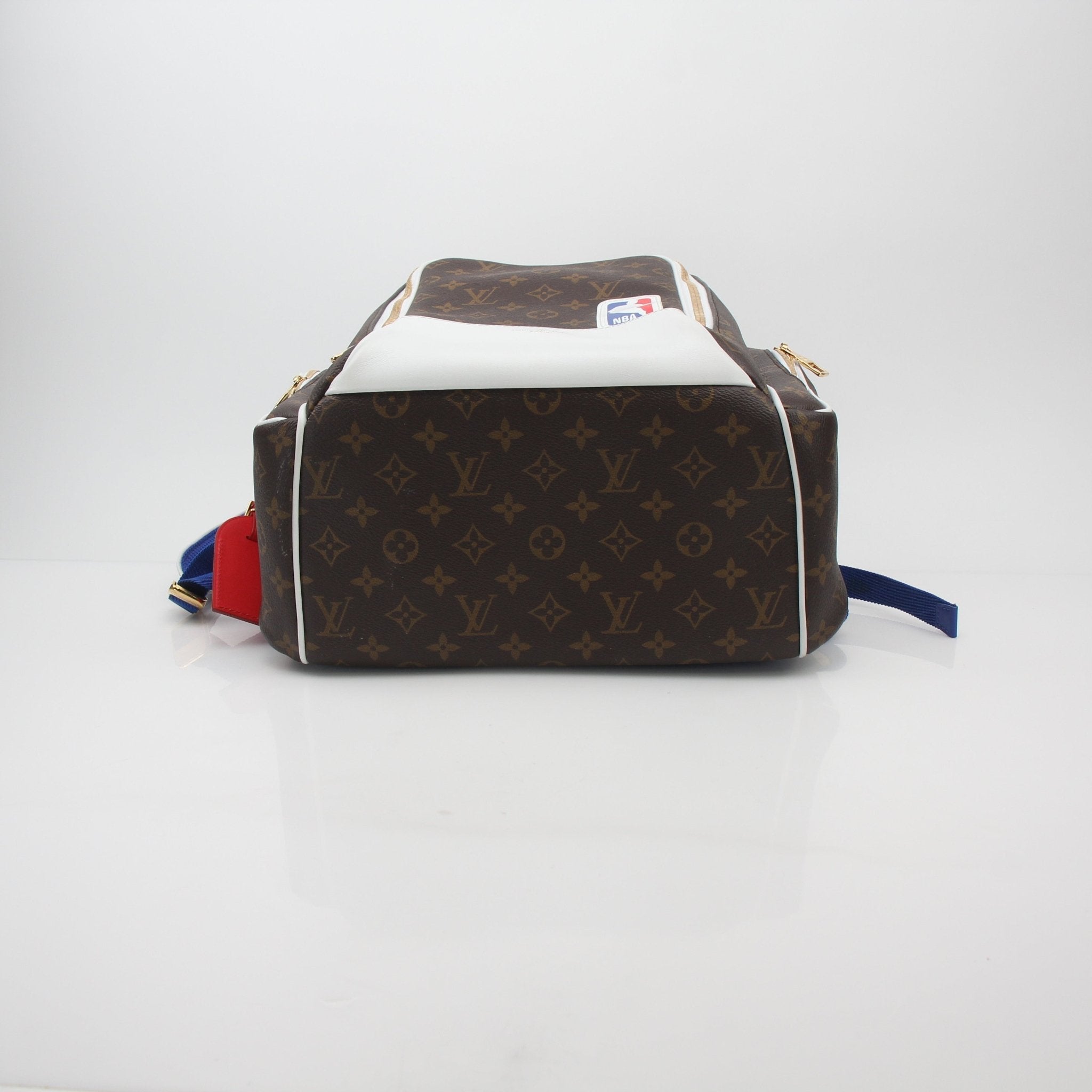Louis Vuitton x NBA Monogram Basketball Backpack, luxury travel bag with basketball-inspired design and monogram pattern.