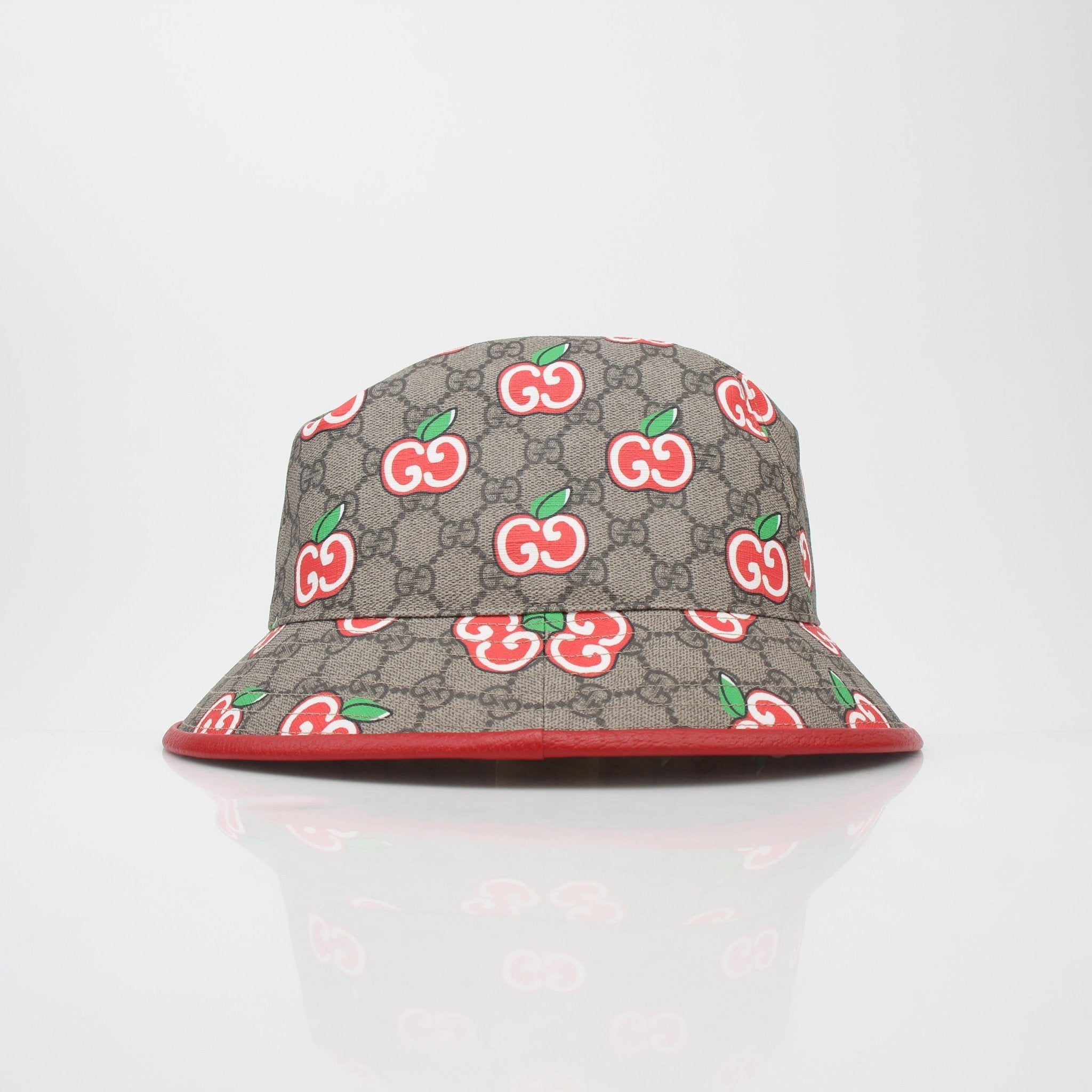 Gucci GG Supreme Apple print bucket hat, stylish accessories with iconic pattern and casual fit, designed by Gold & Beyond.