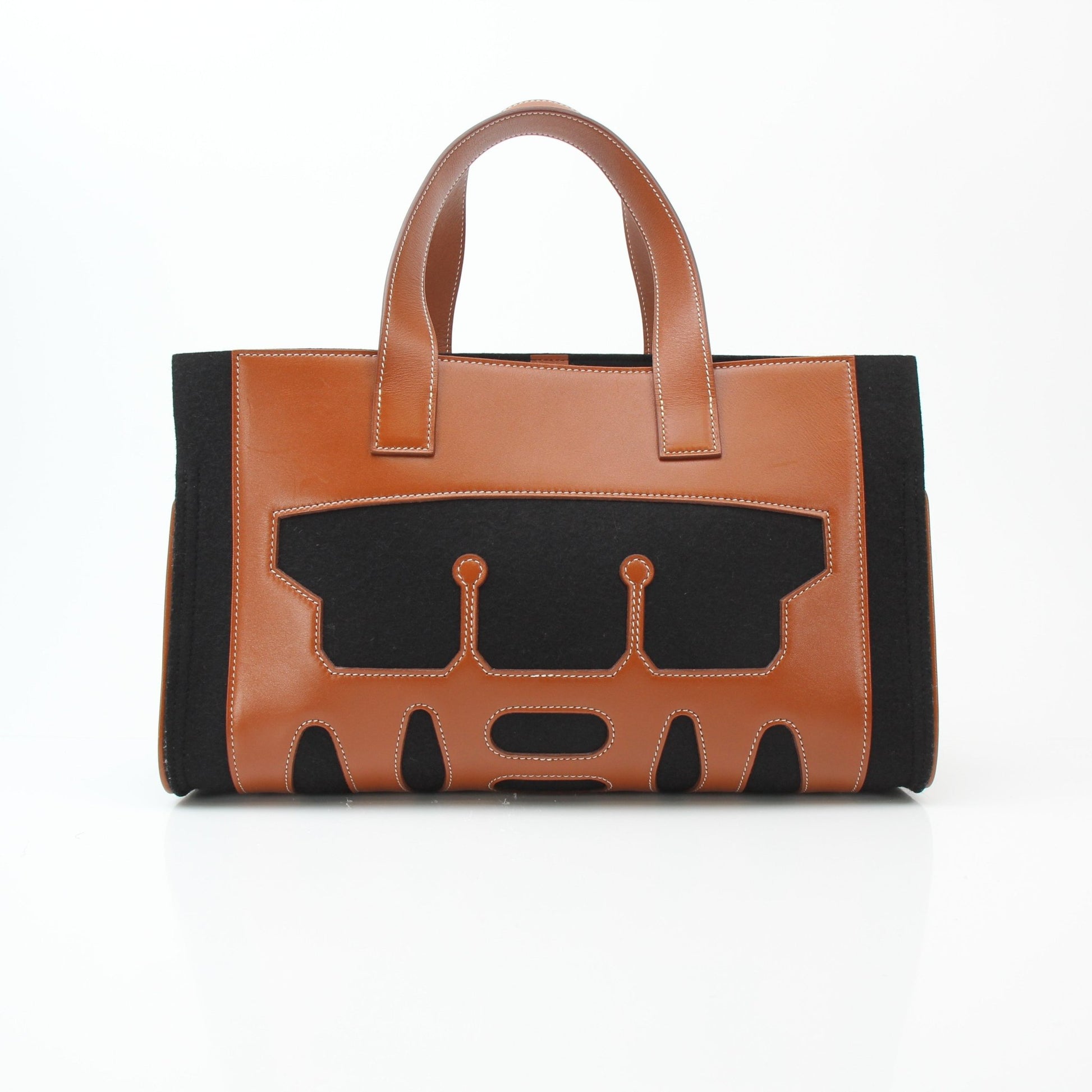 Hermès Petit H Skeleton Garden Tote handbag with leather handles and detailed skeleton garden design, crafted by Gold & Beyond.