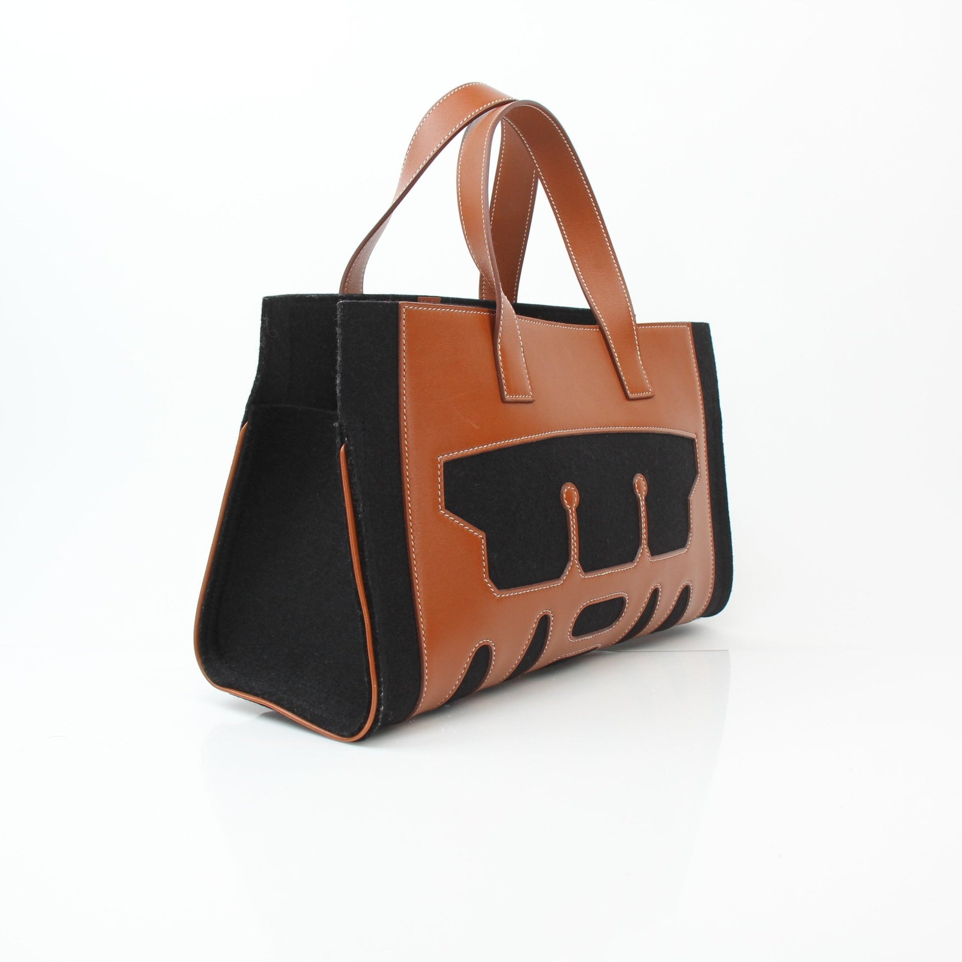 Hermès Petit H Skeleton Garden Tote handbag by Gold & Beyond, showcasing a stylish, structured design with detailed craftsmanship.