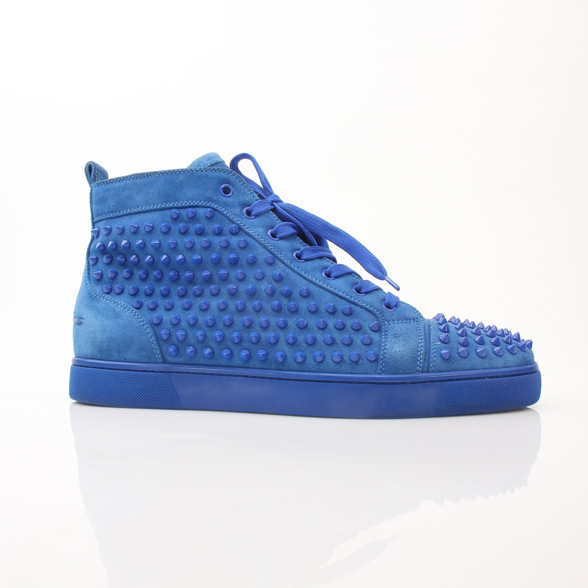 Christian Louboutin men's Louis flat high top sneakers with black leather and signature red soles.
