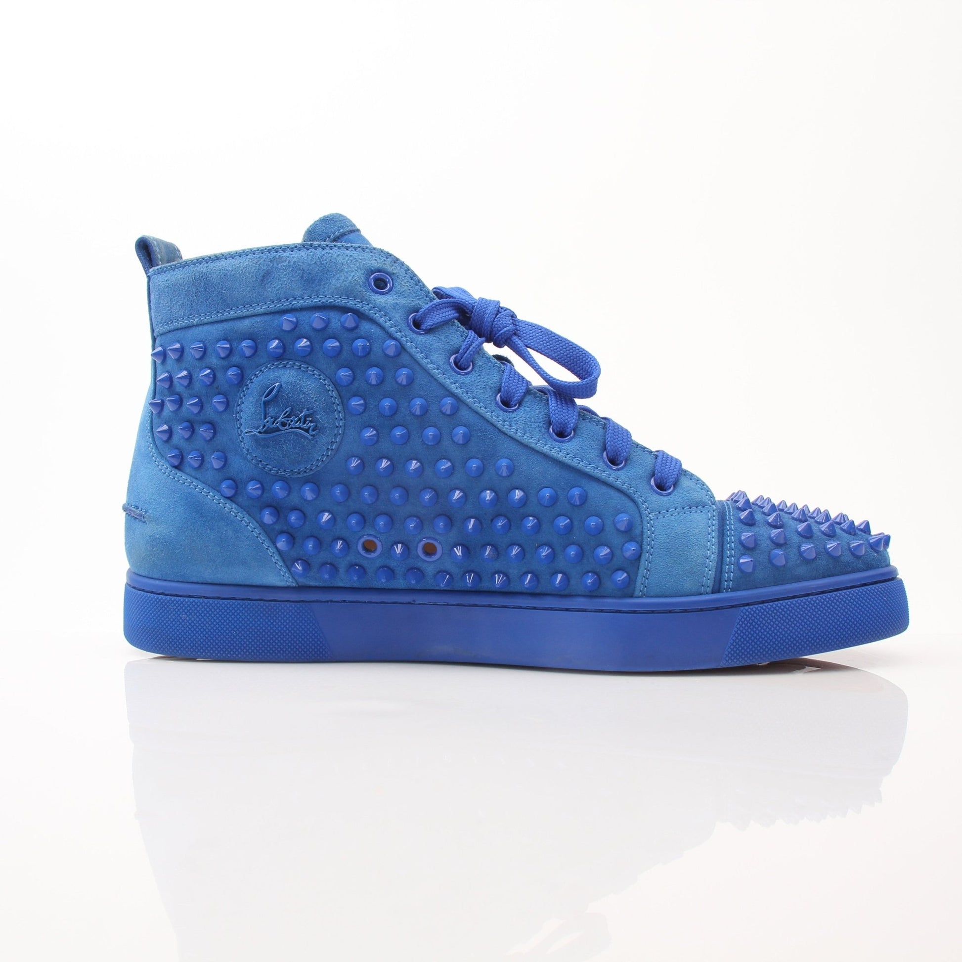 Christian Louboutin men's Louis flat high top sneakers featuring black leather, red soles, and stylish sneaker design.