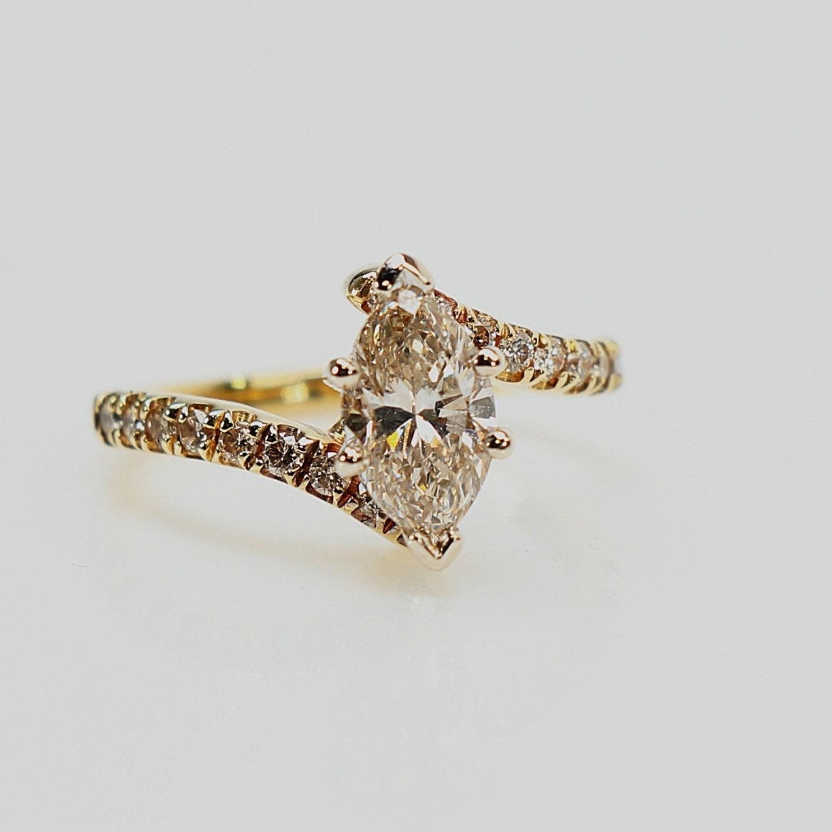 10K yellow gold diamond ring by Gold &amp; Beyond featuring a refined design and elegant sparkle.