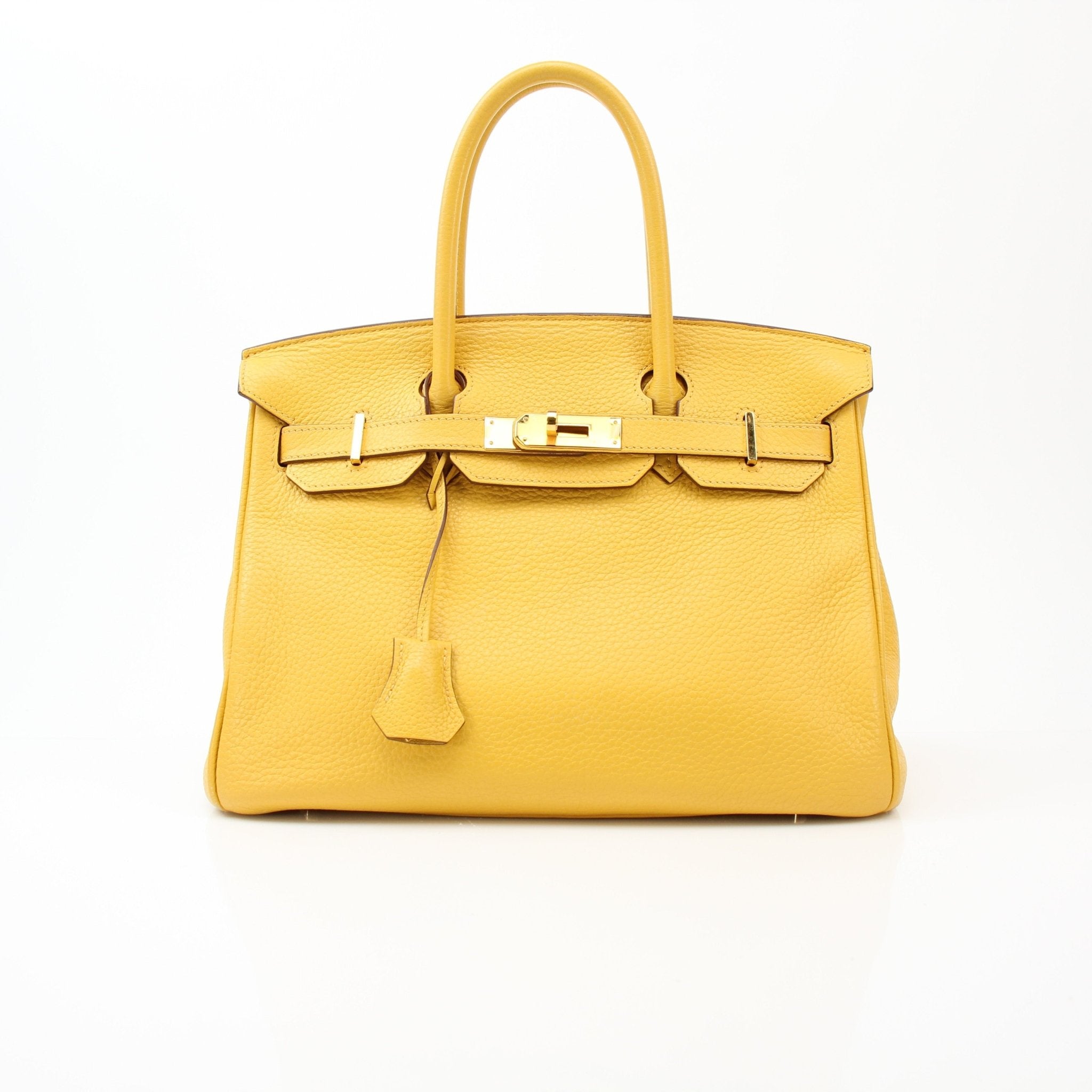Yellow Hermès Birkin 30 handbag by Gold & Beyond displayed with structured leather and gold hardware.