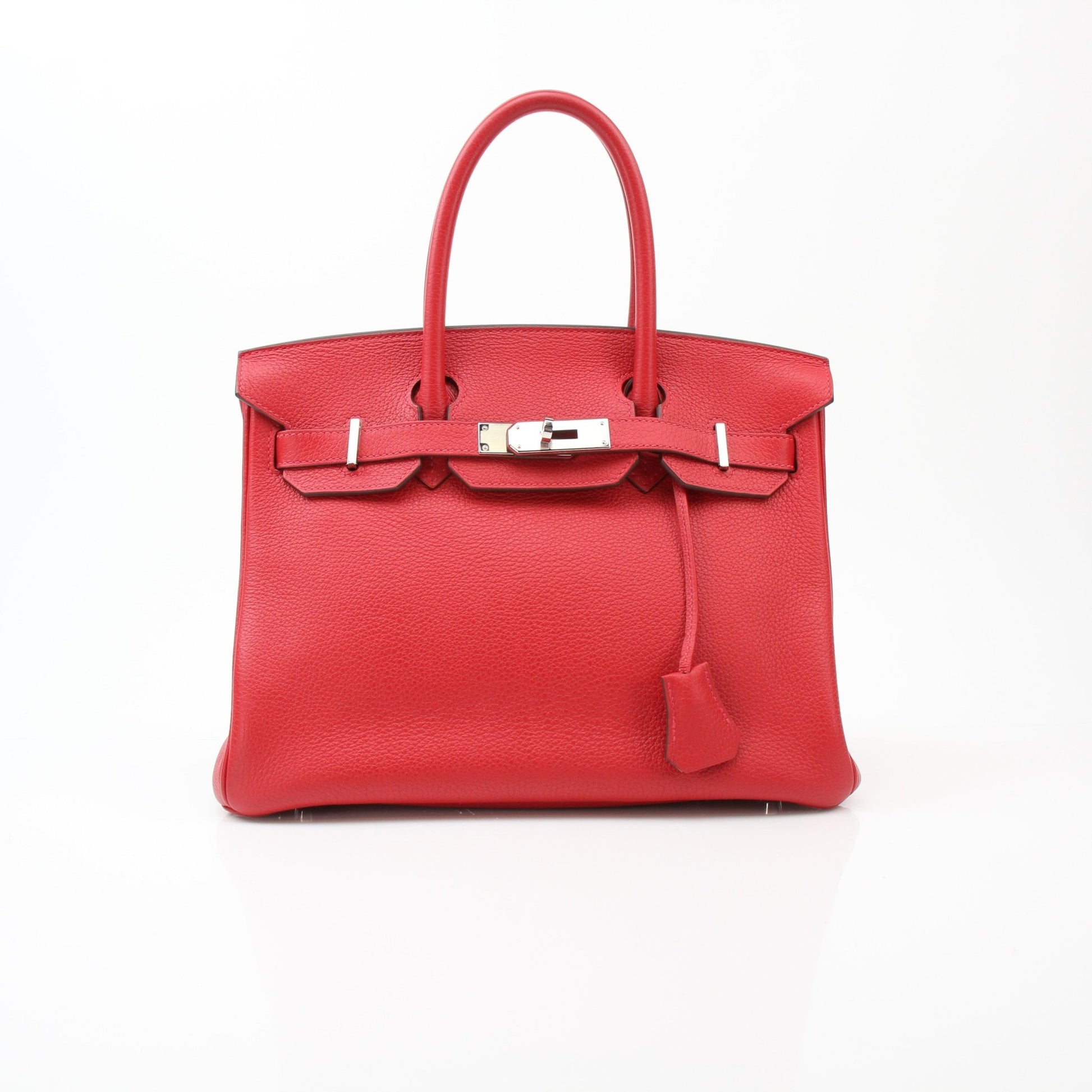 Hermès Birkin 30 Geranium handbag featuring luxurious leather and elegant gold hardware, showcasing the classic design and vibrant color.