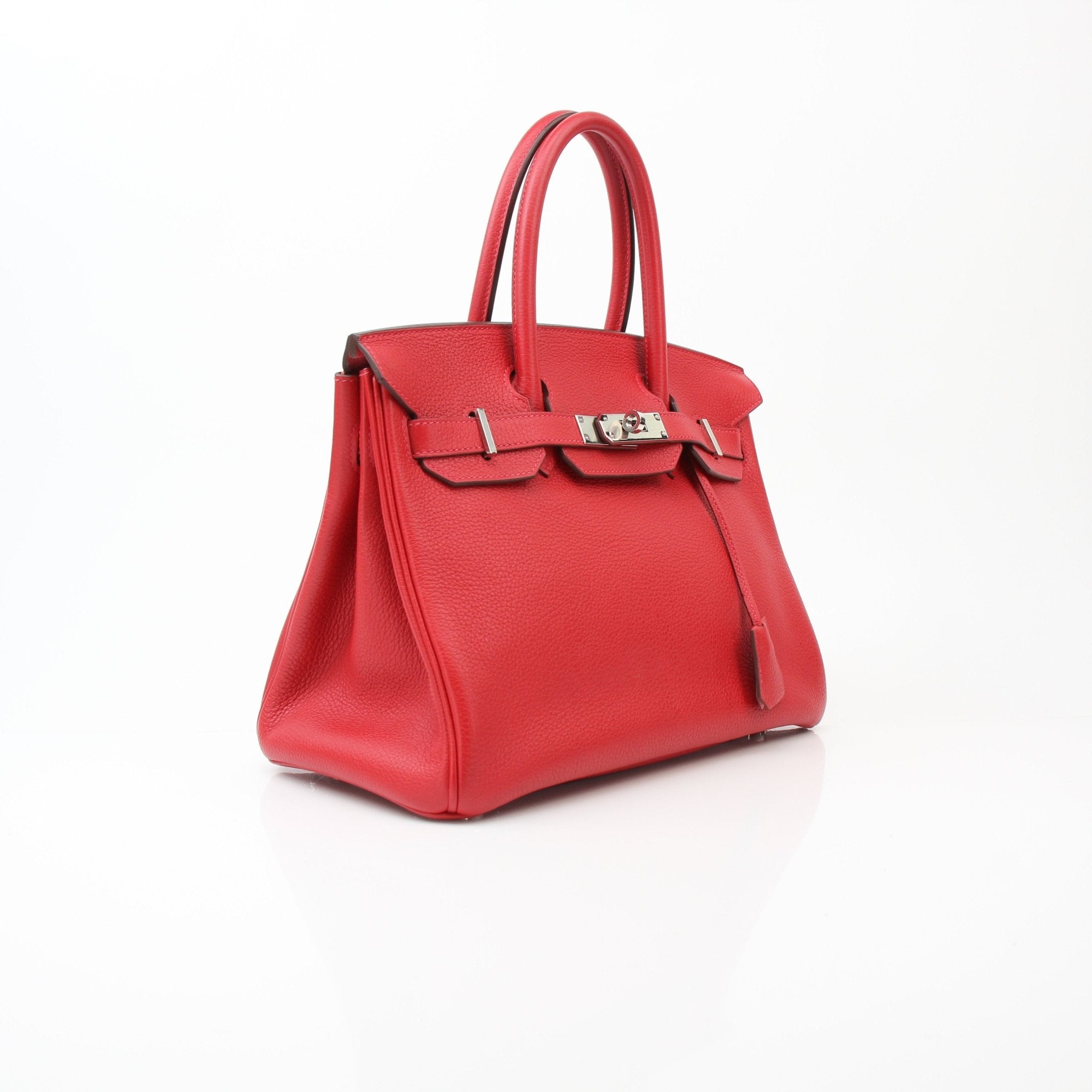 Hermès Birkin 30 Geranium handbag with gold hardware, featuring luxurious leather and classic design, shown in a close-up image.