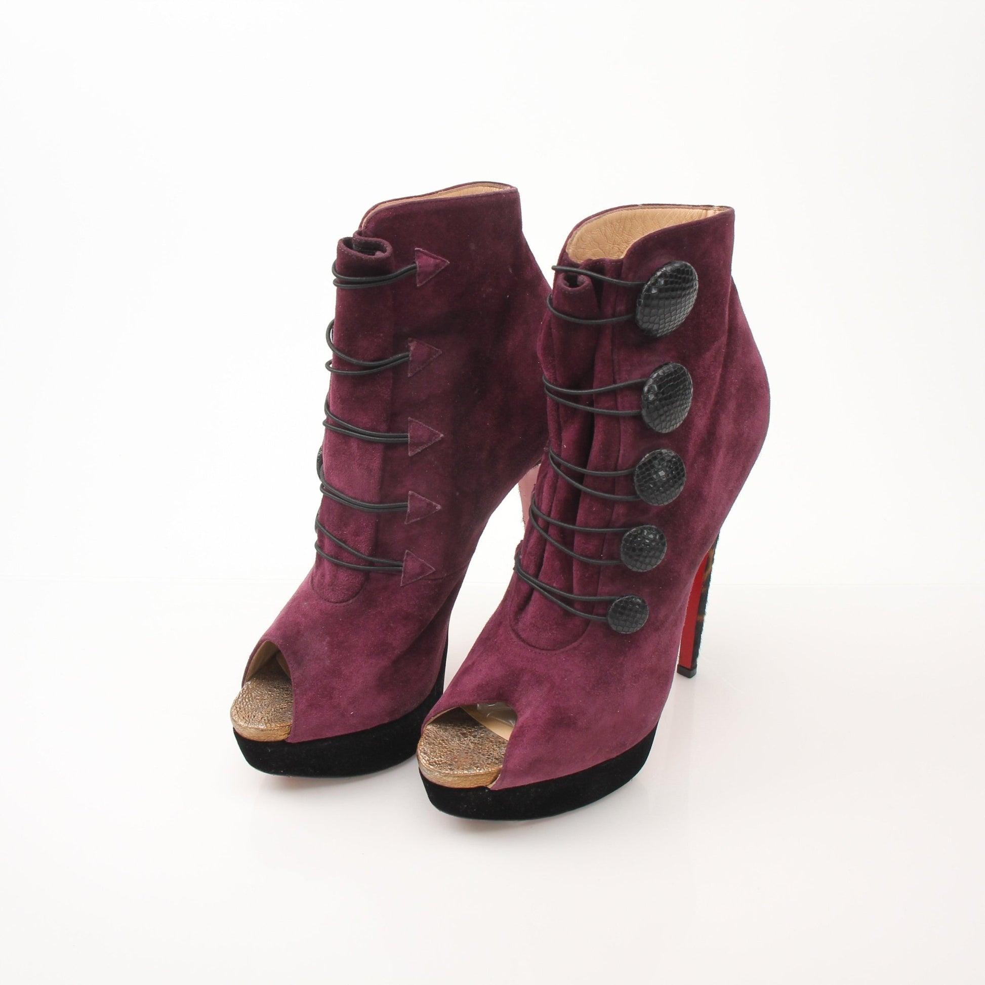 Christian Louboutin Lady Booton 140 ankle boots for women, stylish shoes with signature red sole and sleek design.
