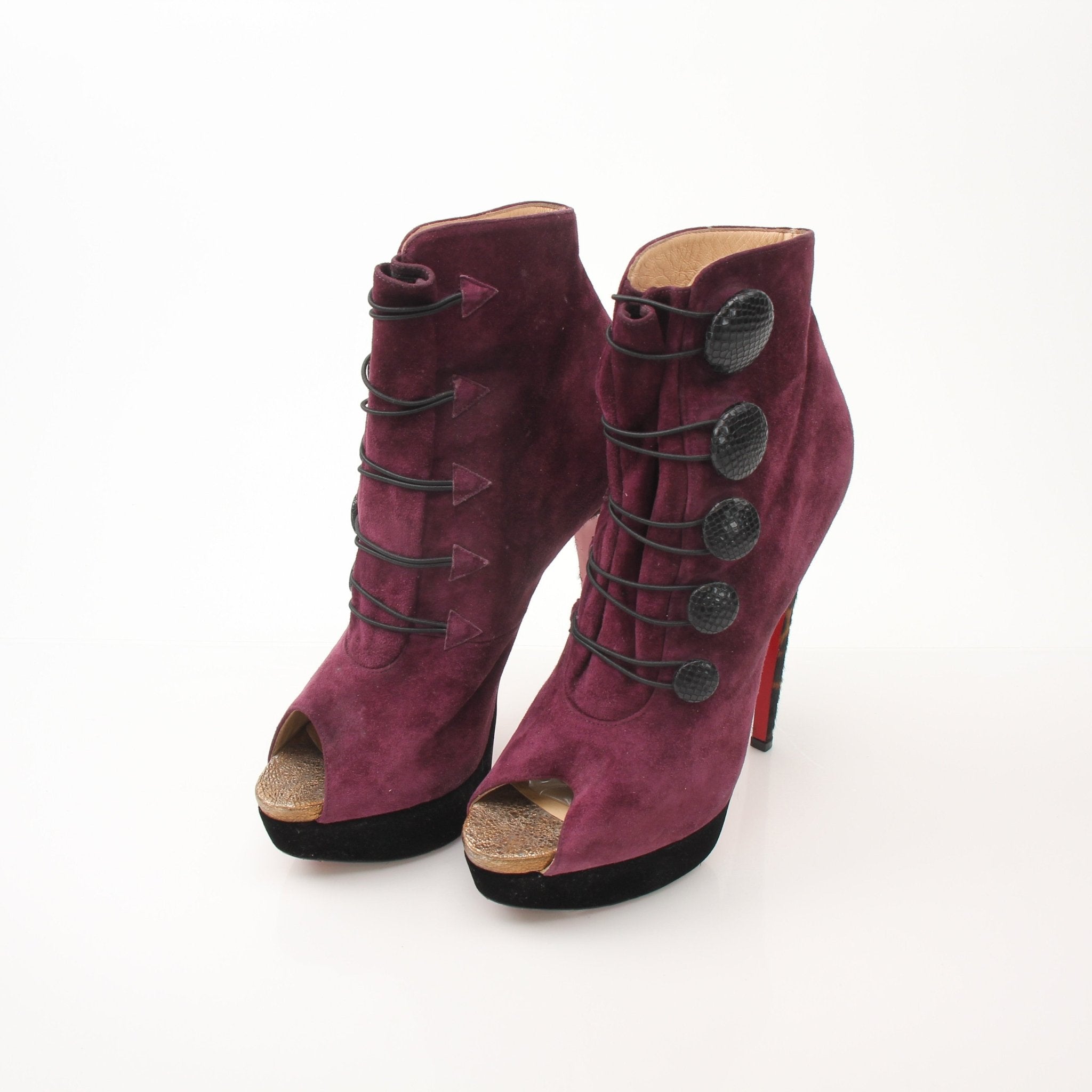 Christian Louboutin Lady Booton 140 ankle boots for women, stylish shoes with signature red sole and sleek design.