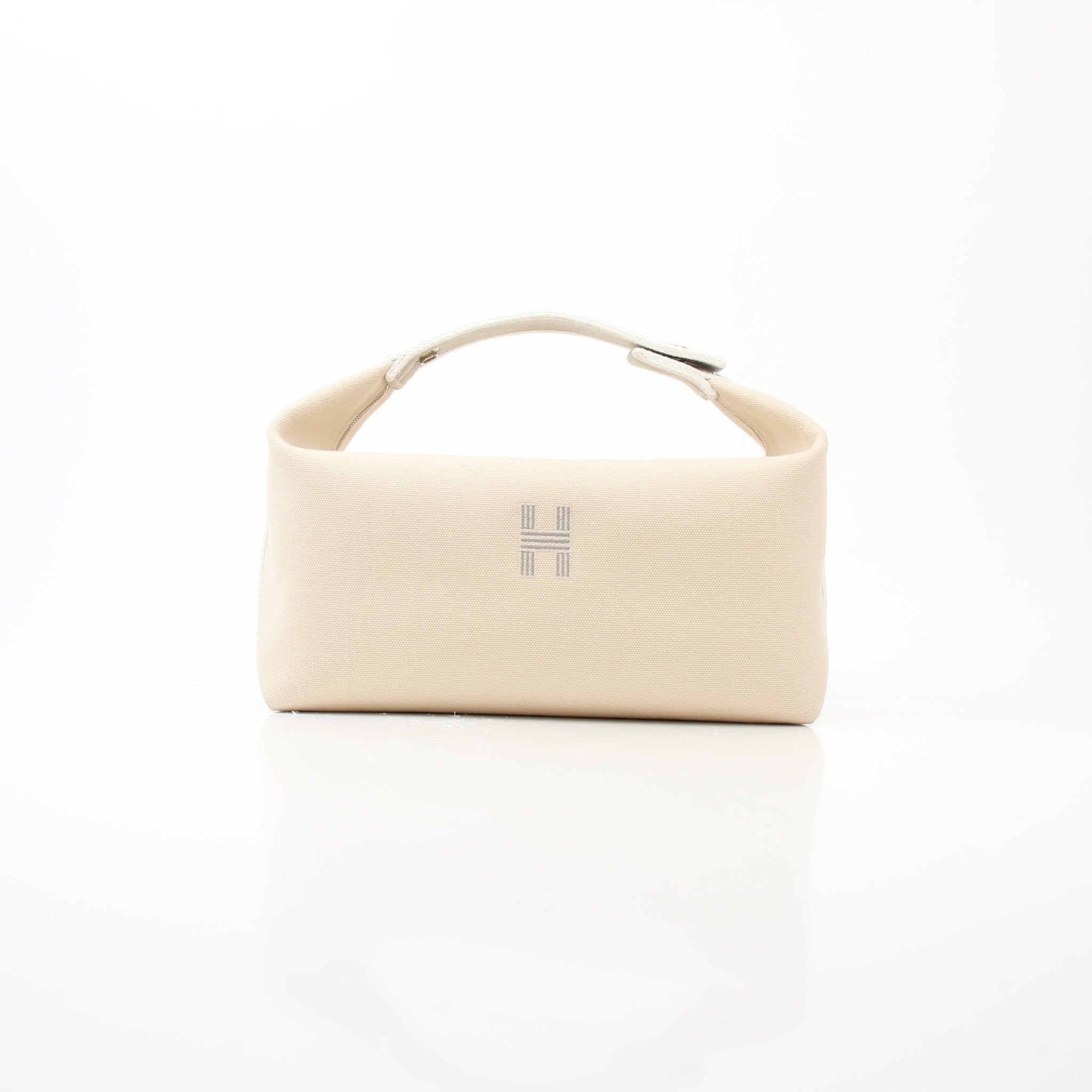 Hermès Bride-a-Brac gray handbag with detailed leather craftsmanship and elegant design, displayed on a neutral background.