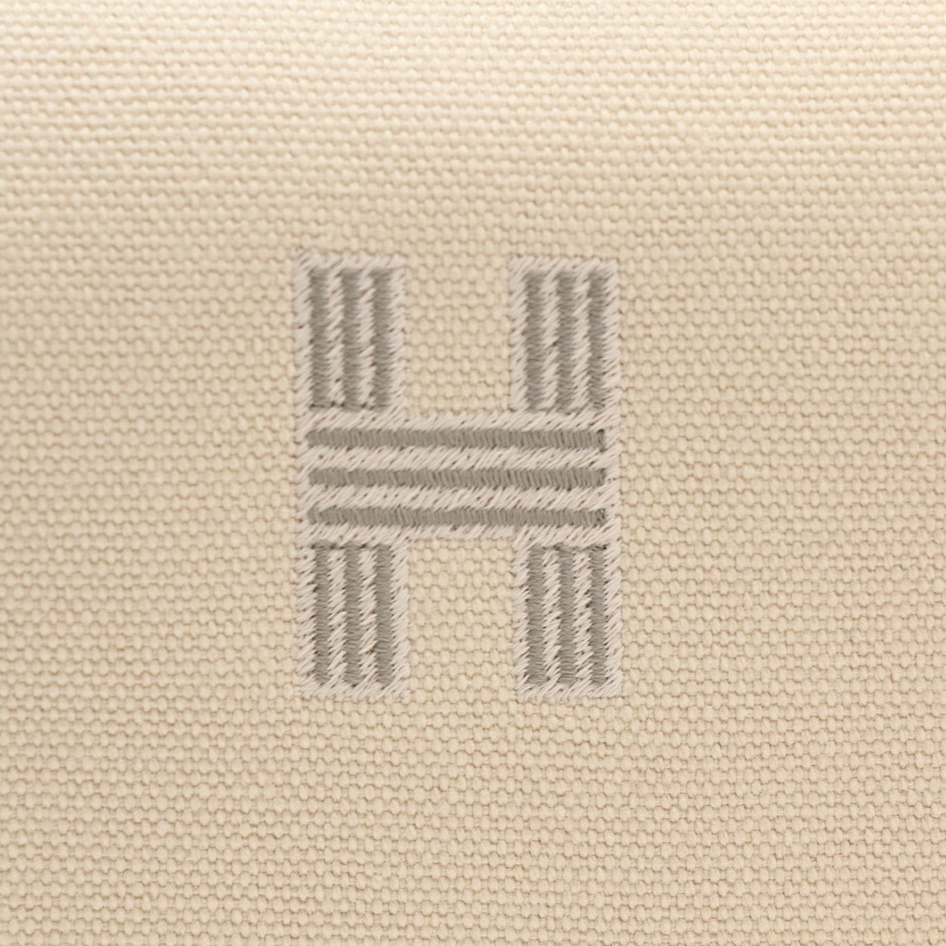 Hermès Bride-a-Brac gray handbag with detailed leather craftsmanship and elegant design, displayed on a plain background.