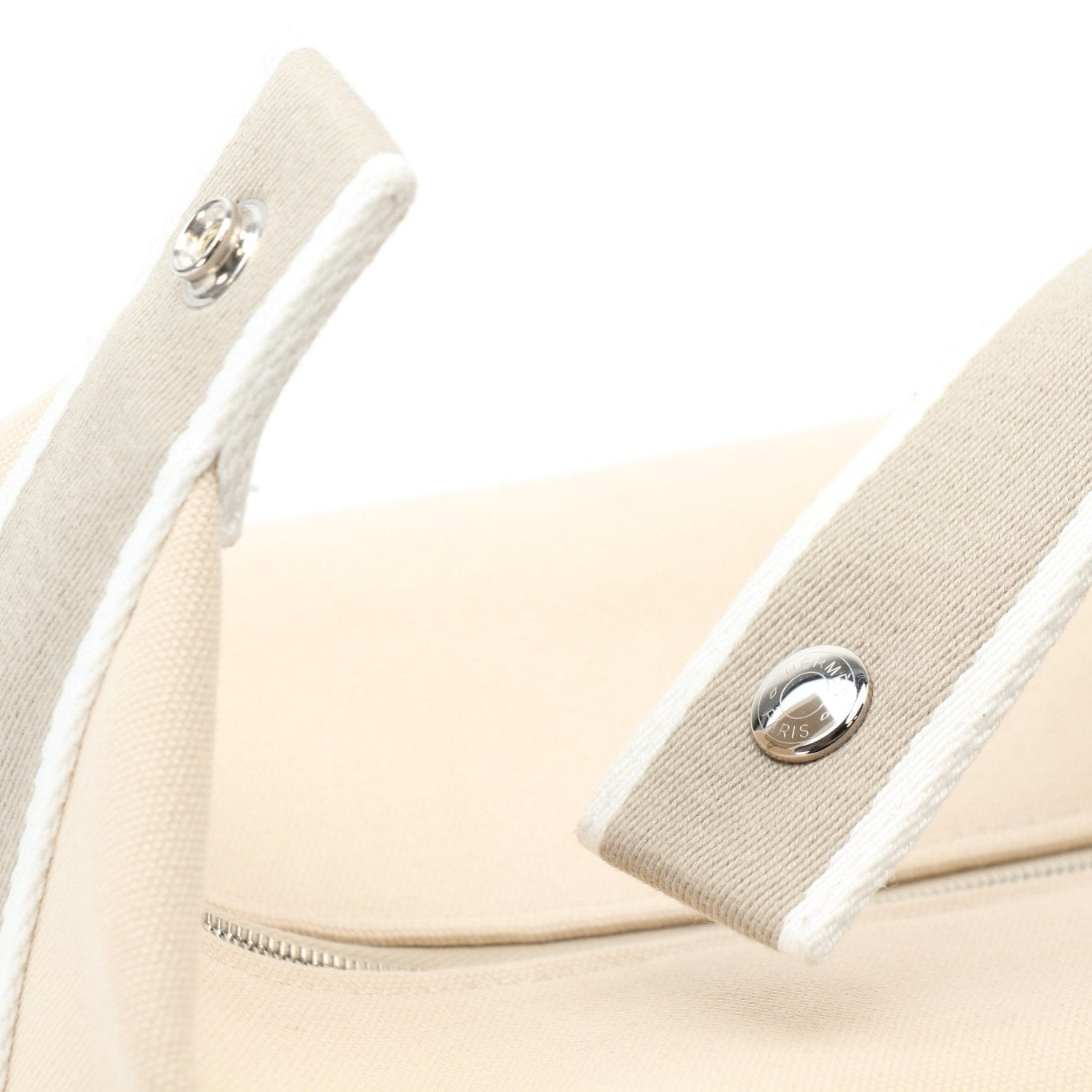 Hermès Bride-a-Brac gray handbag with detailed leatherwork and silver hardware, showcasing elegant craftsmanship and sophisticated style.