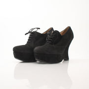 Gold & Beyond Prada women's suede platform wedge ankle boots with chunky heels and stylish ankle height.