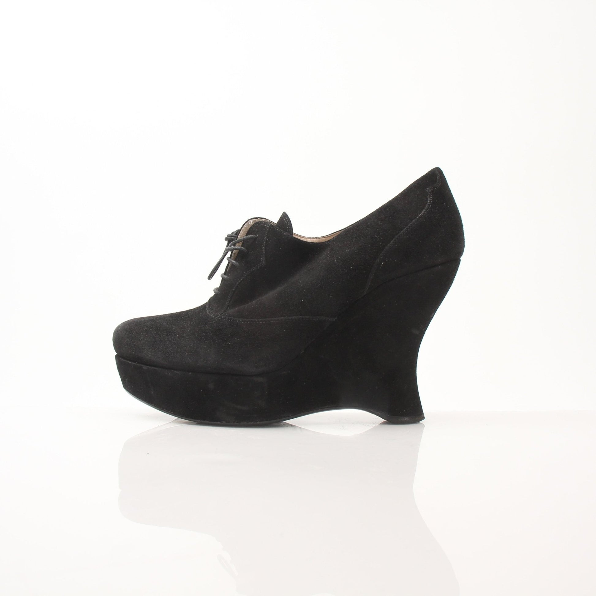 Gold & Beyond Prada women's suede platform wedge ankle boots with chunky heel and ankle-high design.