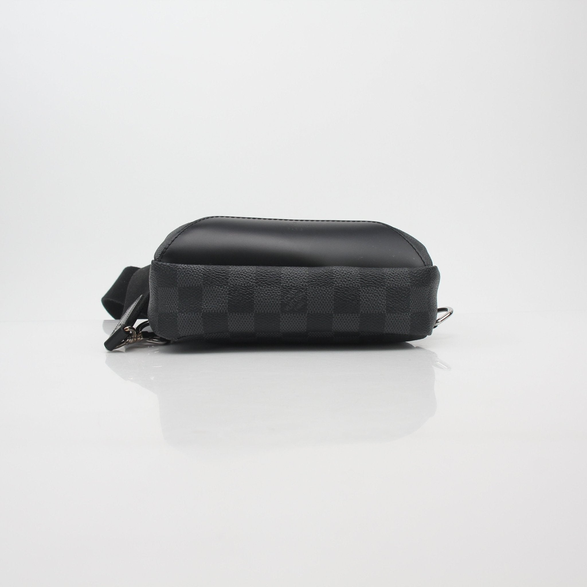 Louis Vuitton Damier Graphite Avenue Sling Bag handbag with adjustable strap and gold hardware, featuring signature checkerboard pattern.