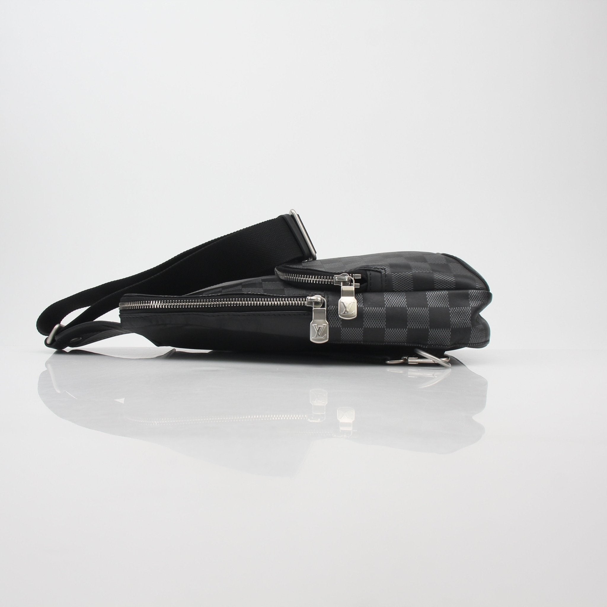 Louis Vuitton Damier Graphite Avenue Sling Bag handbag with adjustable strap and signature checkered pattern.