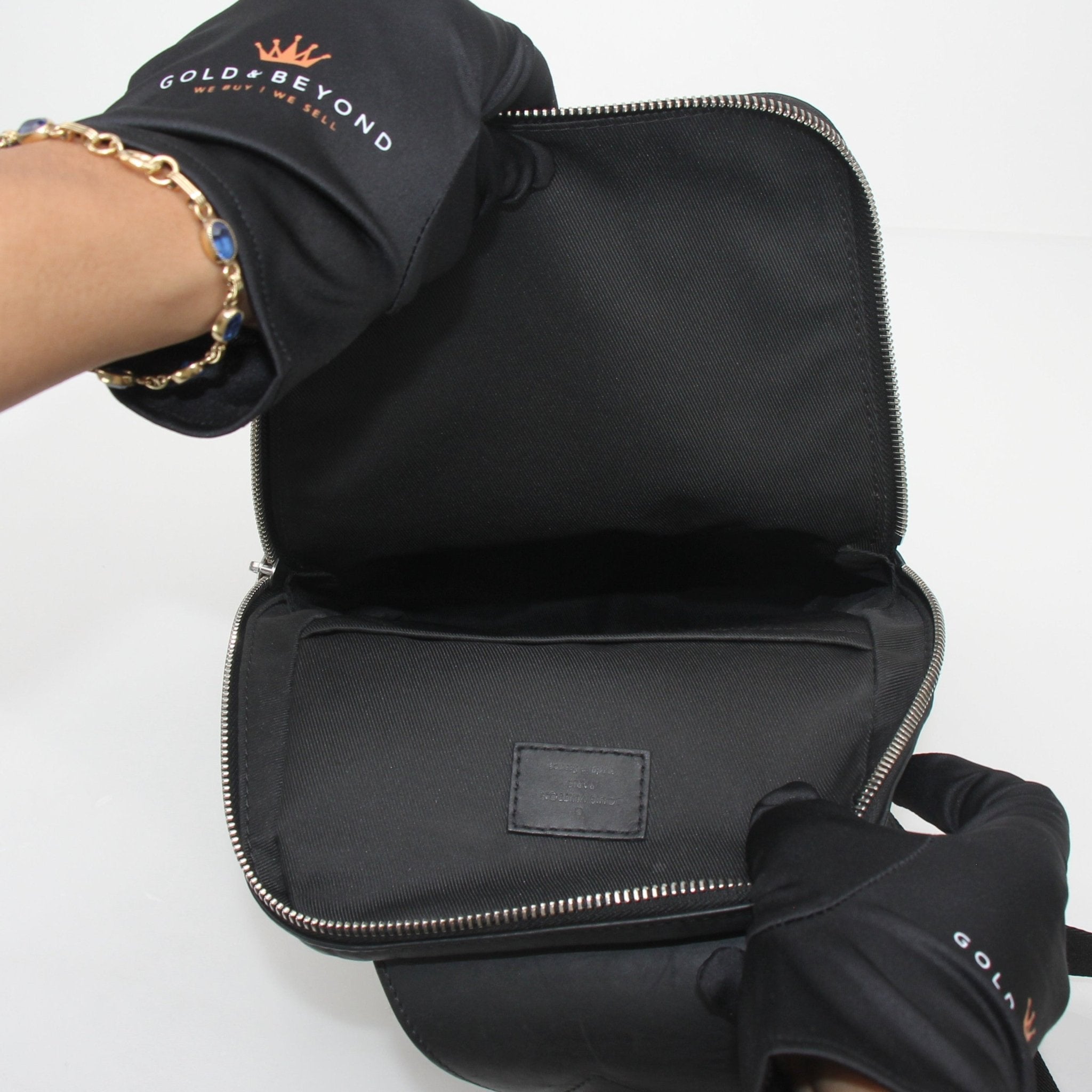 Louis Vuitton Damier Graphite Avenue Sling Bag handbag with adjustable strap and gold accents, featuring signature checkered pattern.