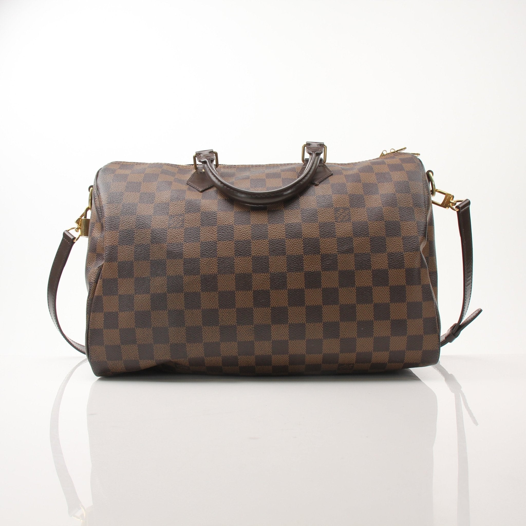 Gold & Beyond Louis Vuitton Speedy Bandouliere 35 shoes featuring stylish design and premium craftsmanship.