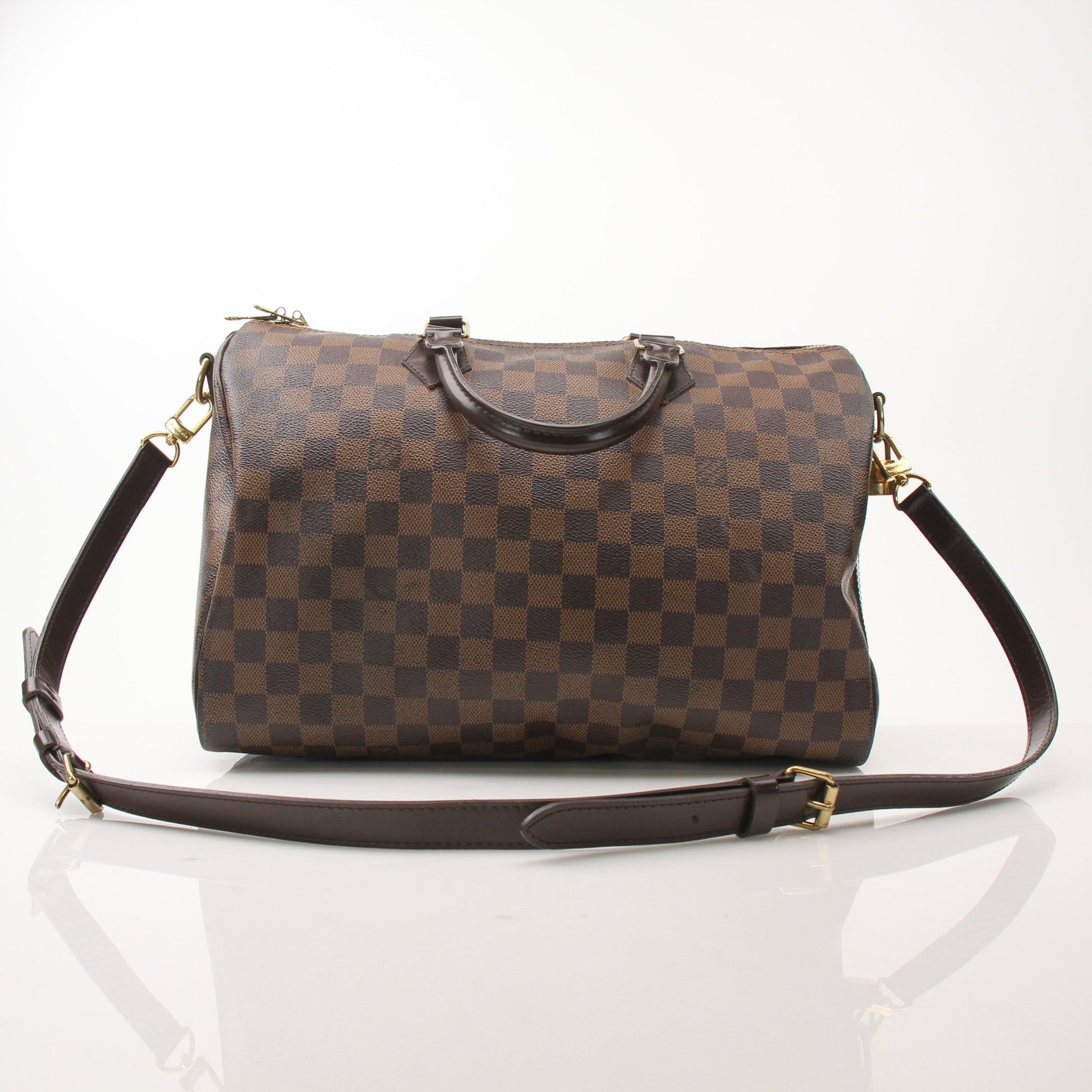 Gold & Beyond shoes inspired by Louis Vuitton Speedy Bandouliere 35, featuring stylish design and high-quality materials.