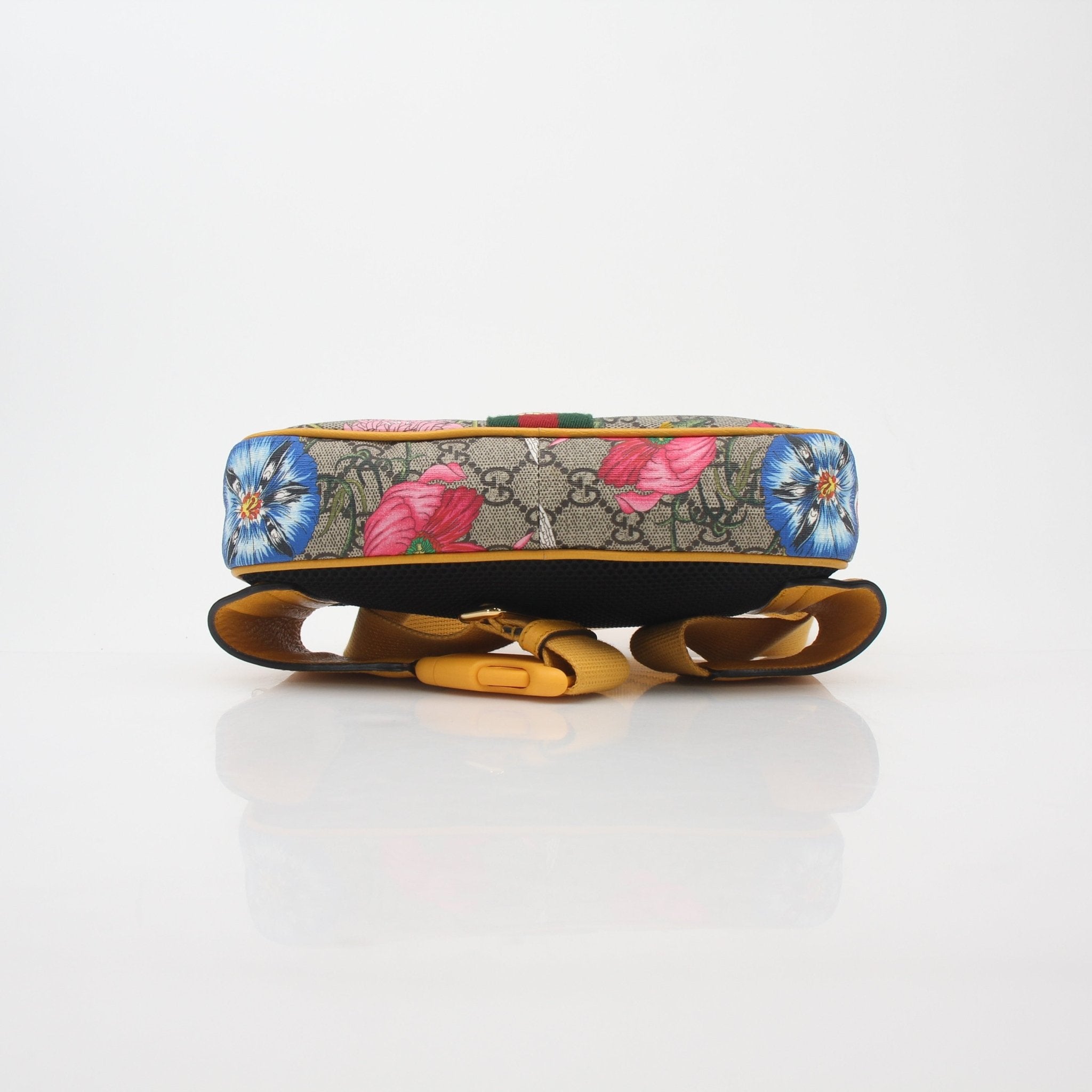Gucci Beige Flora Ophidia GG Supreme belt bag with gold hardware, featuring floral pattern and adjustable strap.