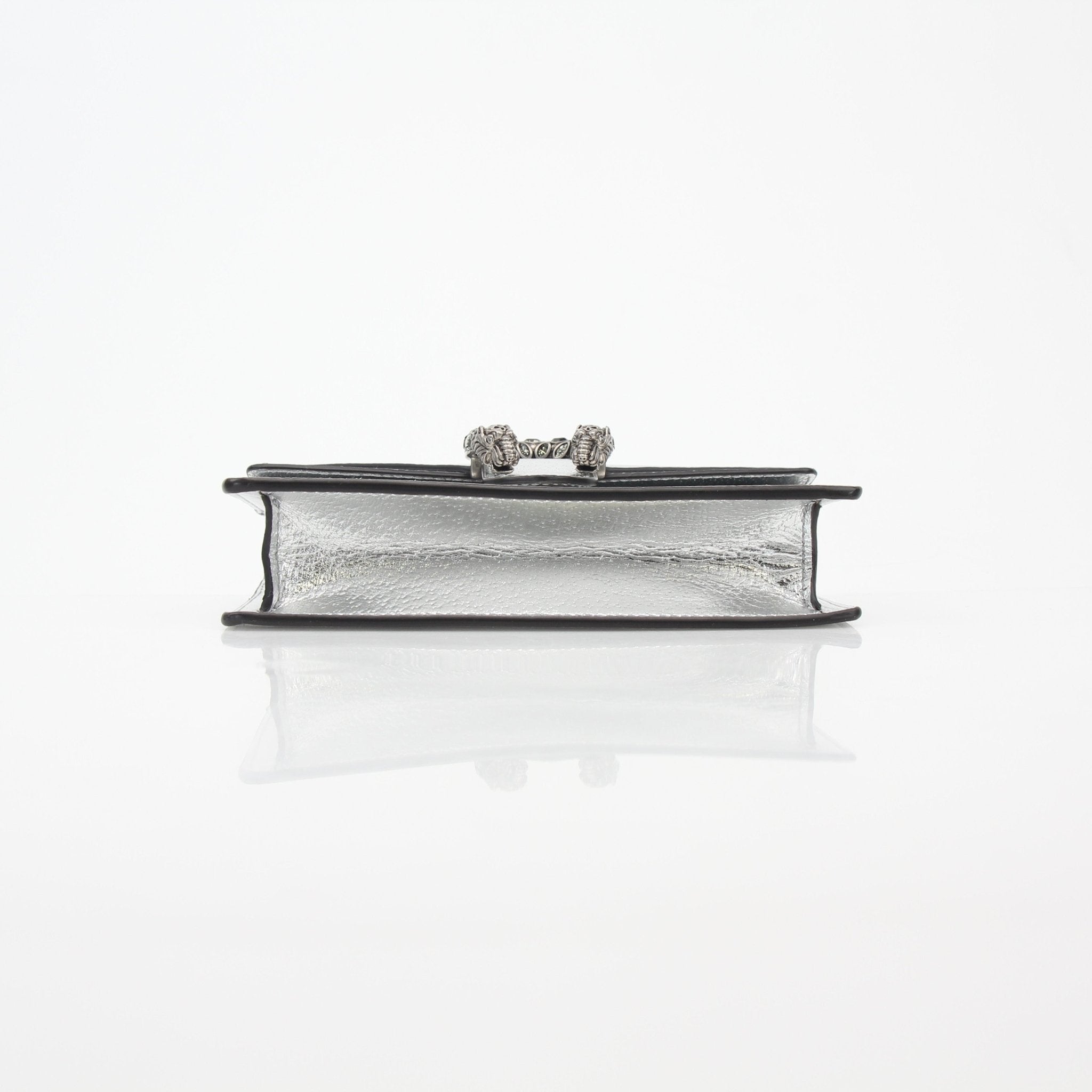 Gucci silver metallic Dionysus super mini shoulder handbag with chain strap and signature tiger head detail.