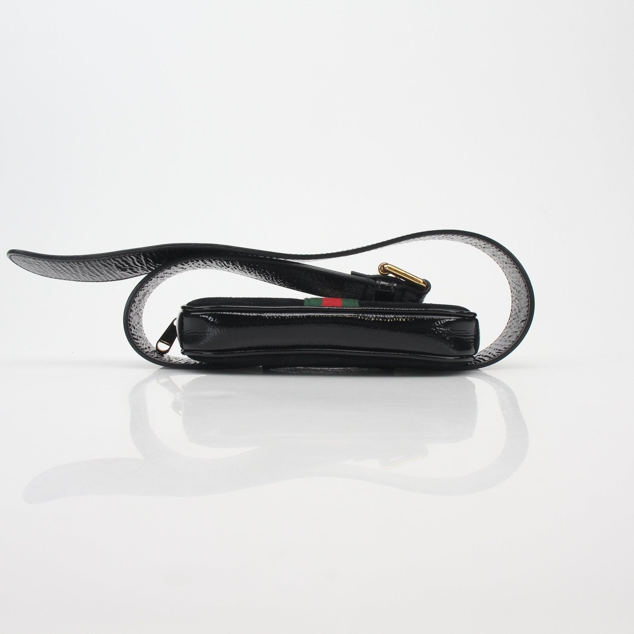 Gucci Black Ophidia Mini Belt Bag handbag with signature web stripe and gold-tone hardware, worn crossbody or around the waist.