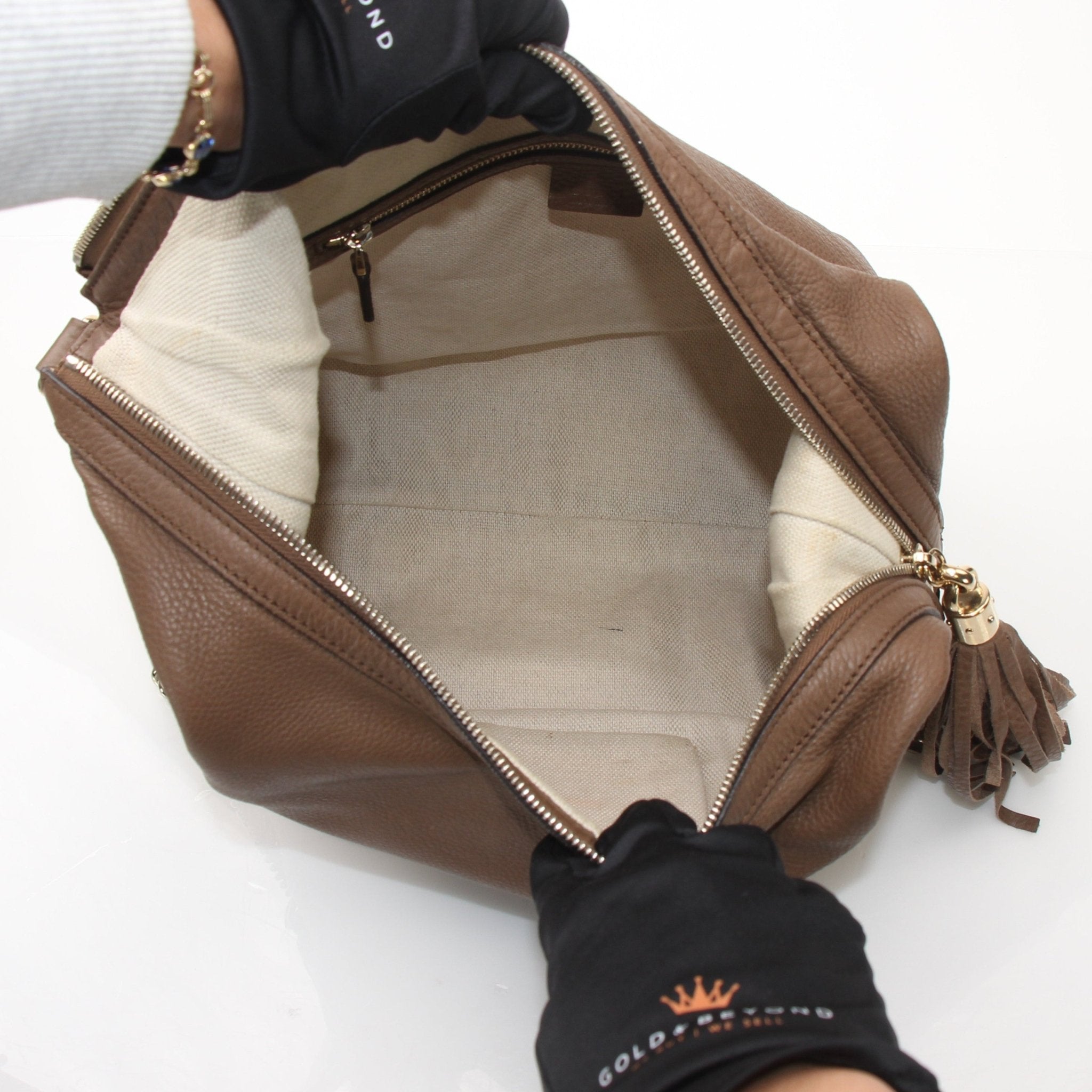 Gold & Beyond Gucci Soho Chain Shoulder Bag, stylish black handbag with gold chain strap and logo detail.