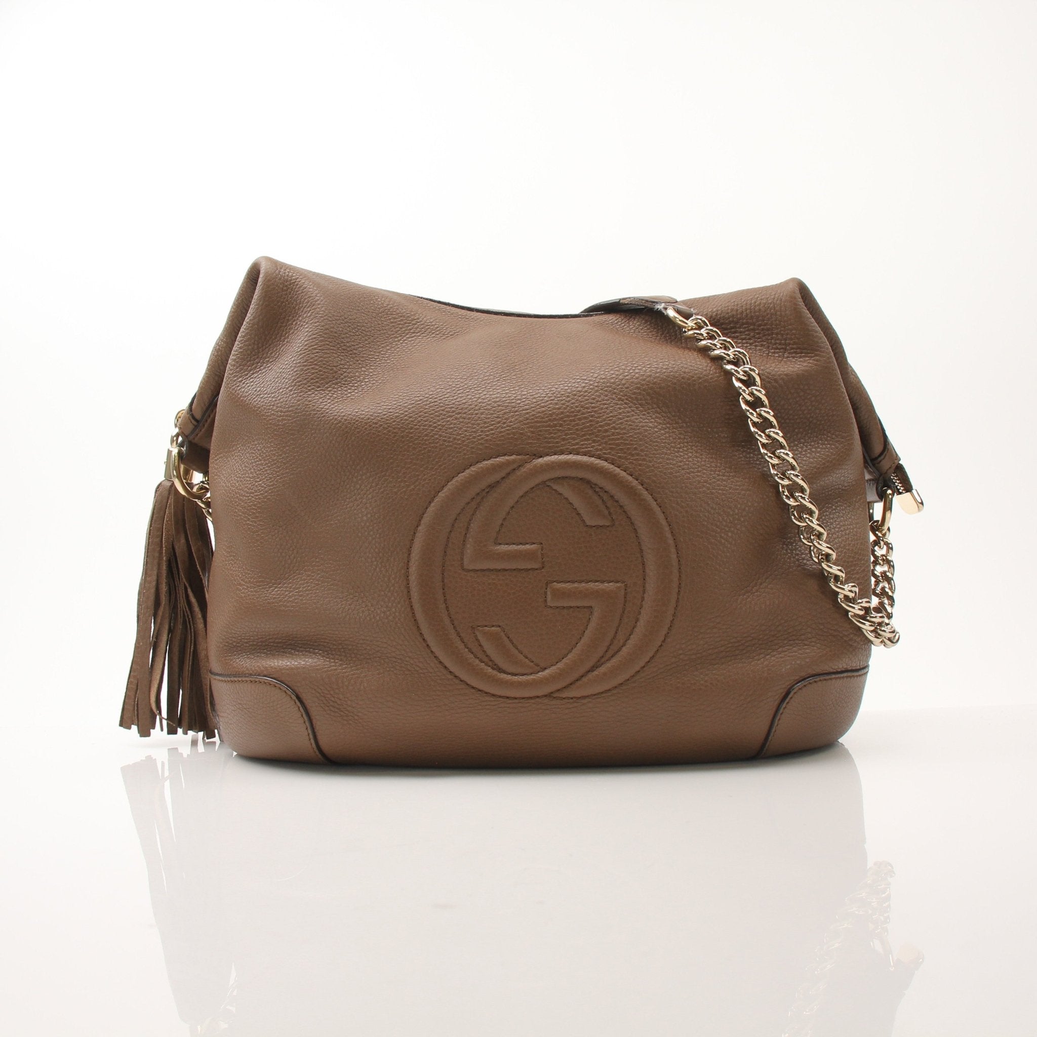 Gucci Soho Chain Shoulder Bag with gold chain strap and leather body, stylish handbag by Gold & Beyond.