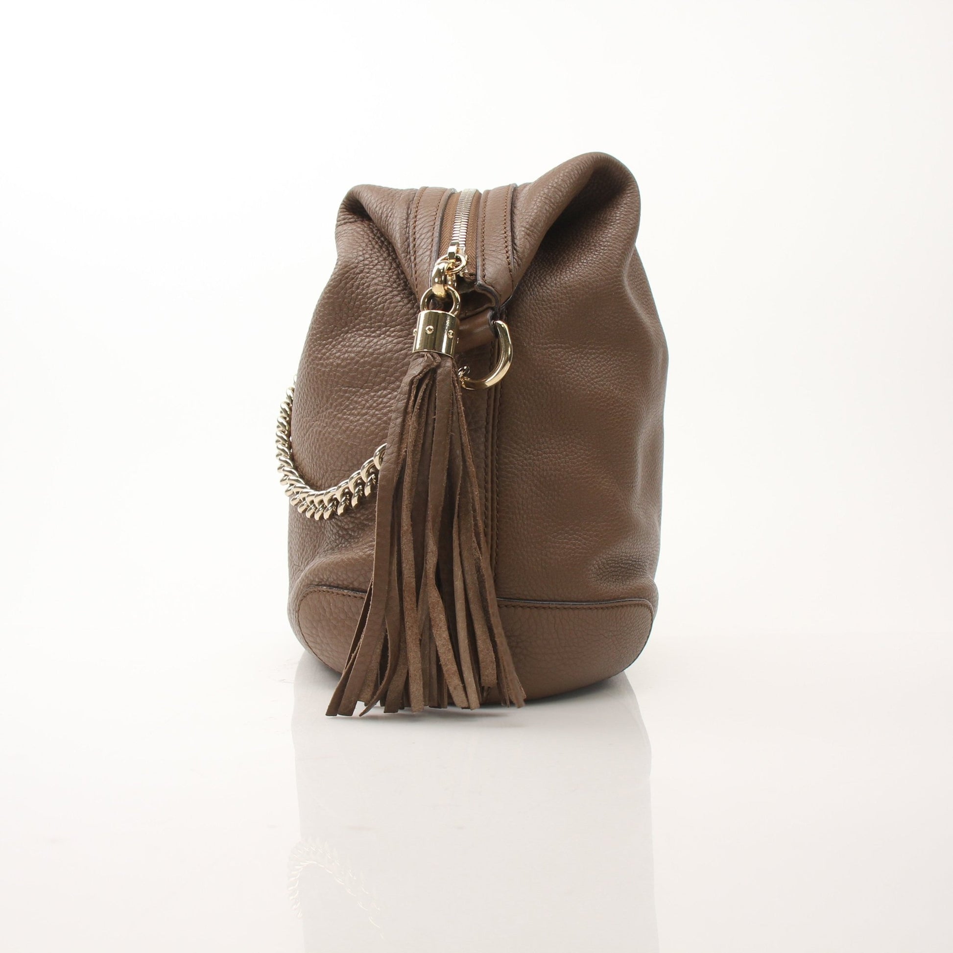 Gucci Soho Chain Shoulder Bag with gold chain strap and black leather body, stylish handbag by Gold & Beyond.
