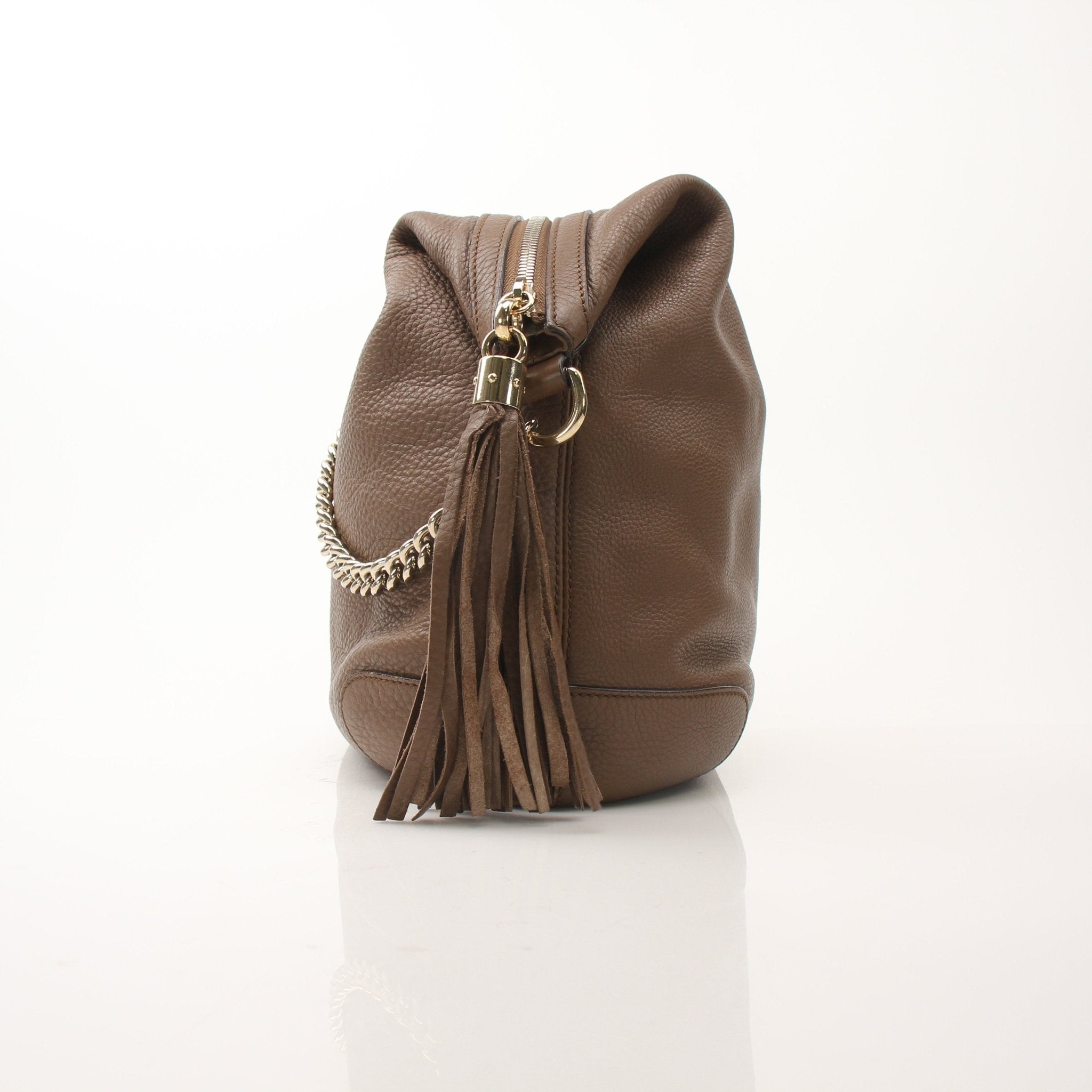 Gucci Soho Chain Shoulder Bag with gold chain strap and black leather body, stylish handbag by Gold & Beyond.