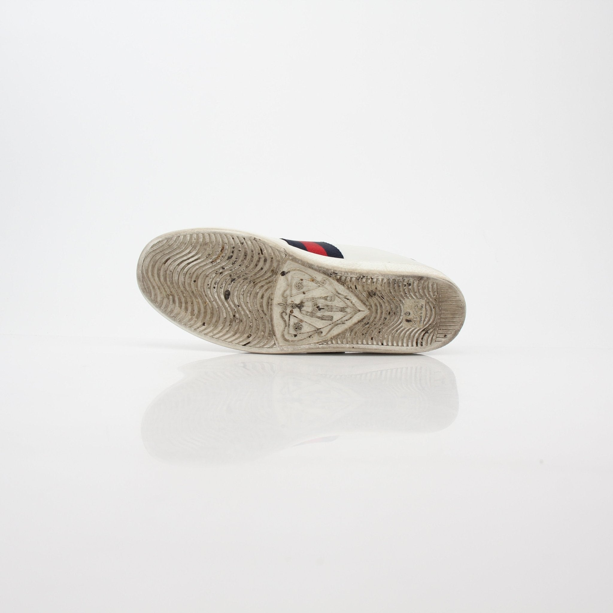 Gucci White Ace embroidered leather sneakers with logo details, stylish casual footwear from Gold & Beyond.