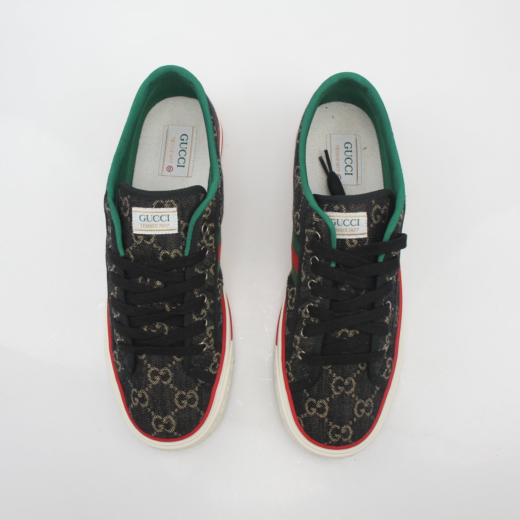 Gold & Beyond Gucci black GG denim tennis shoes, 1977 low-top sneakers with stylish design and iconic branding.