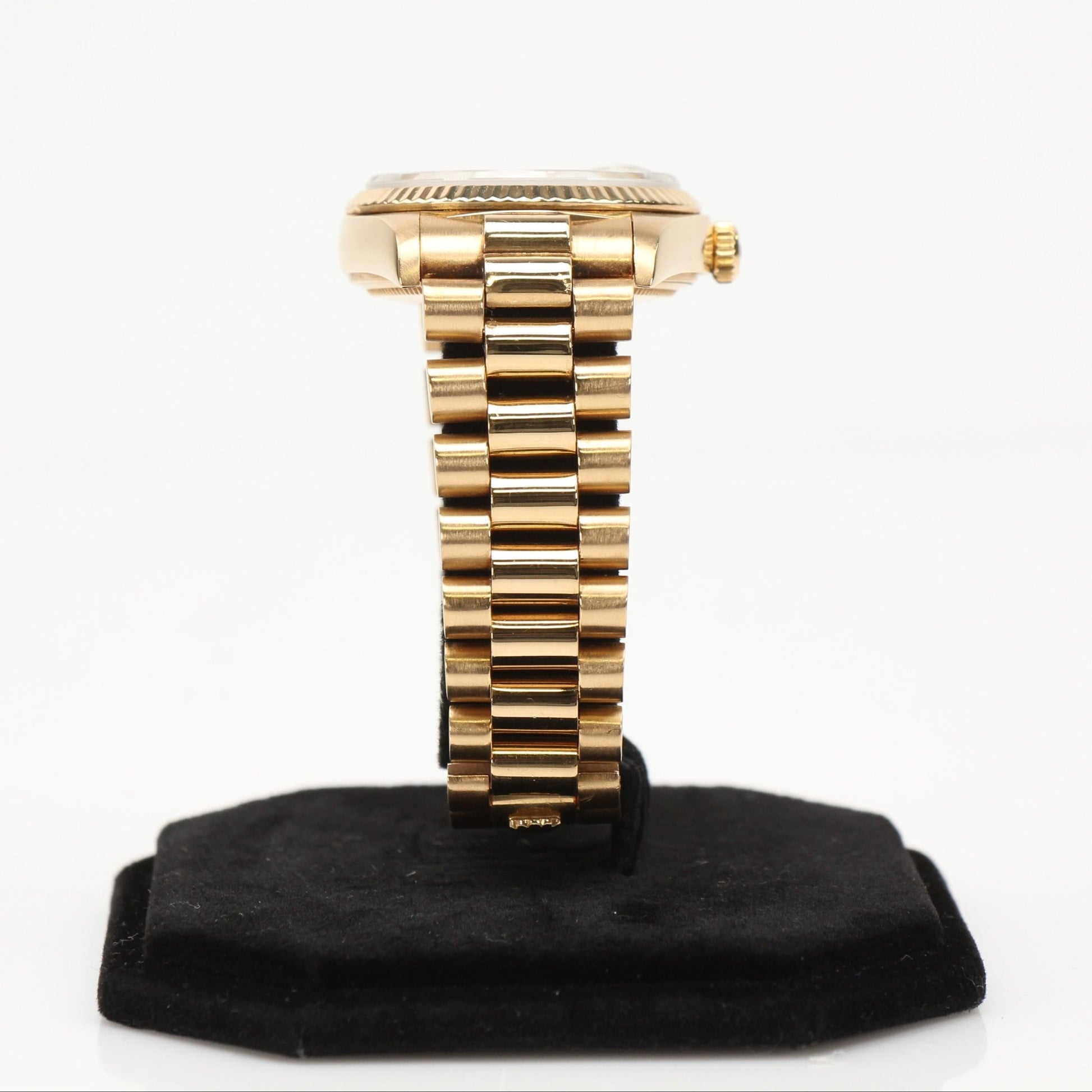 Gold & Beyond Rolex Day-Date 36 gold watch with sleek design and classic President bracelet, showcasing luxurious wristwear.