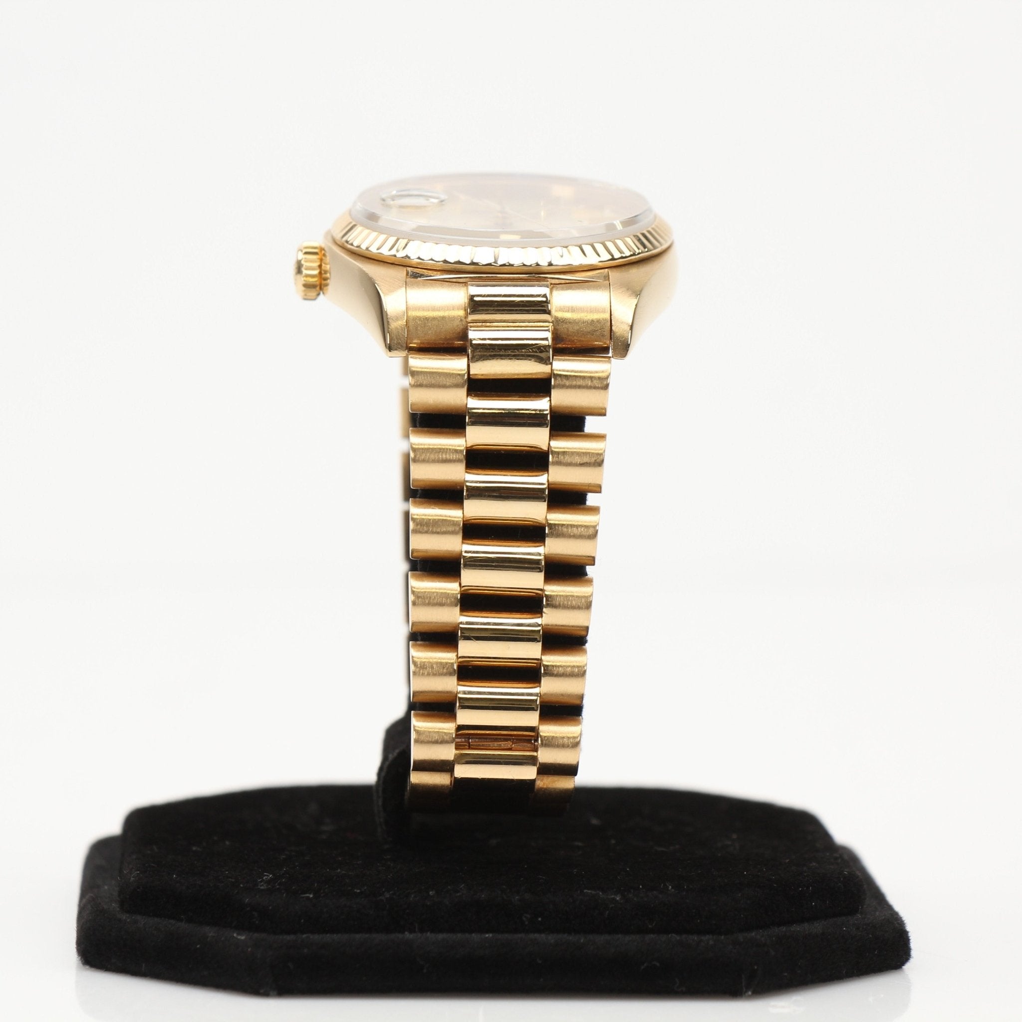 Gold & Beyond Rolex Day-Date 36 gold watch with a classic dial and President bracelet, showcasing luxury and craftsmanship.