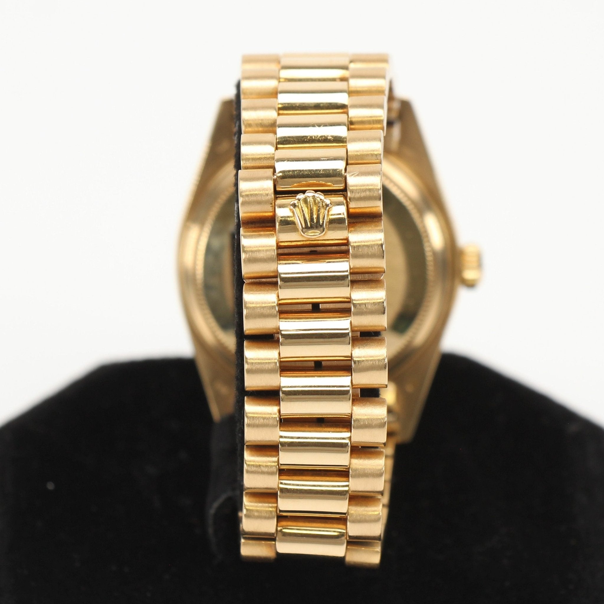 Gold Rolex Day-Date 36 watch with gold bracelet and dial, luxurious timepiece by Gold & Beyond.