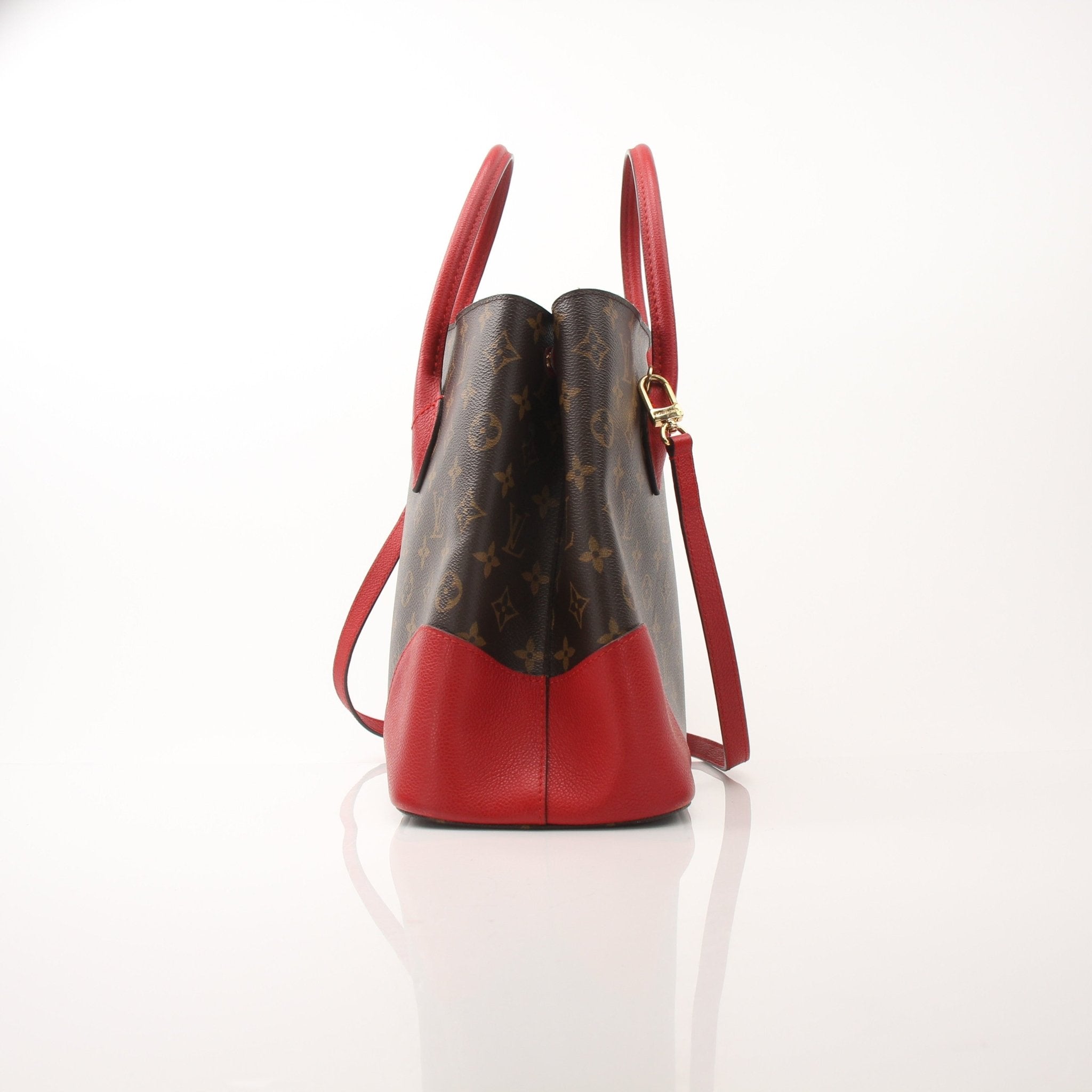 Gold & Beyond Louis Vuitton Flandrin Tote Bag, stylish handbag with leather handles and signature monogram pattern.