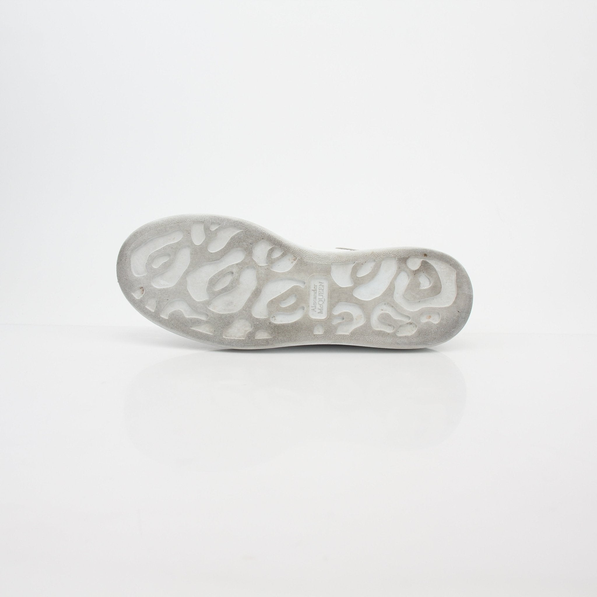 Alexander McQueen white oversized iridescent heel sneakers with chunky soles and stylish design, perfect for fashionable casual wear.