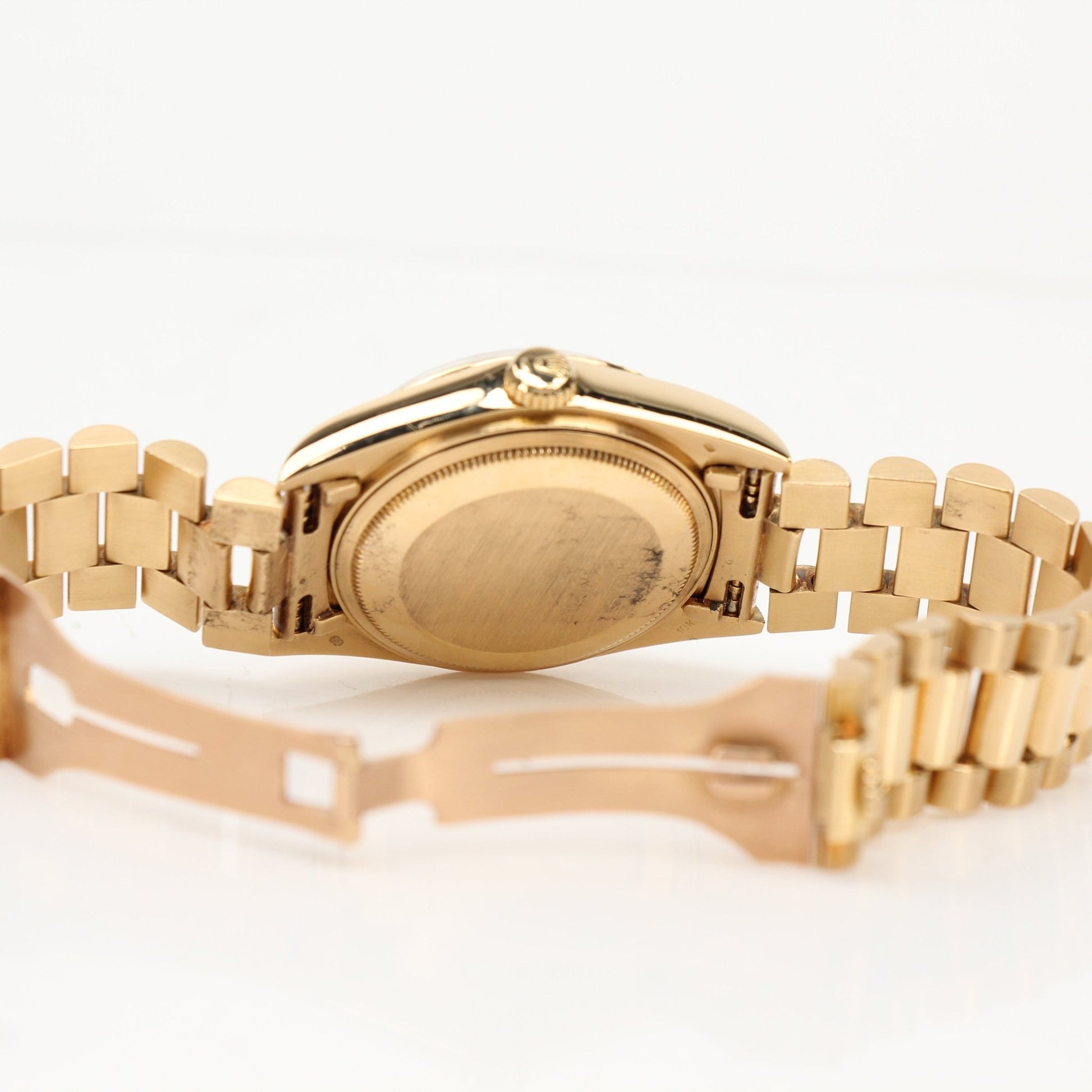 Rolex Day-Date 36 gold watch with President bracelet and champagne dial, luxury timepiece from Gold & Beyond.