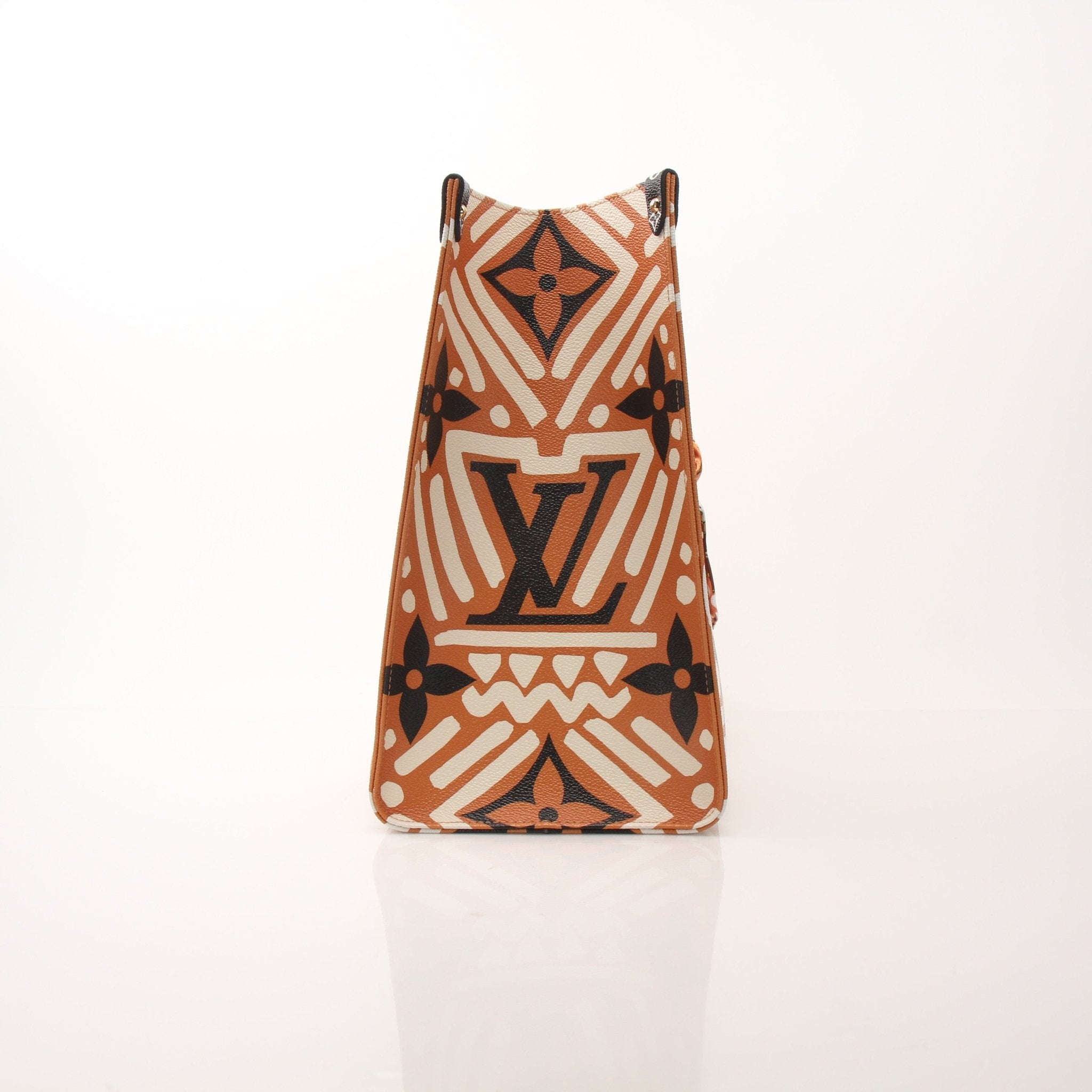 Gold & Beyond Louis Vuitton OnTheGo Crafty GM Tote handbag with tan leather handles and LV monogram canvas design.