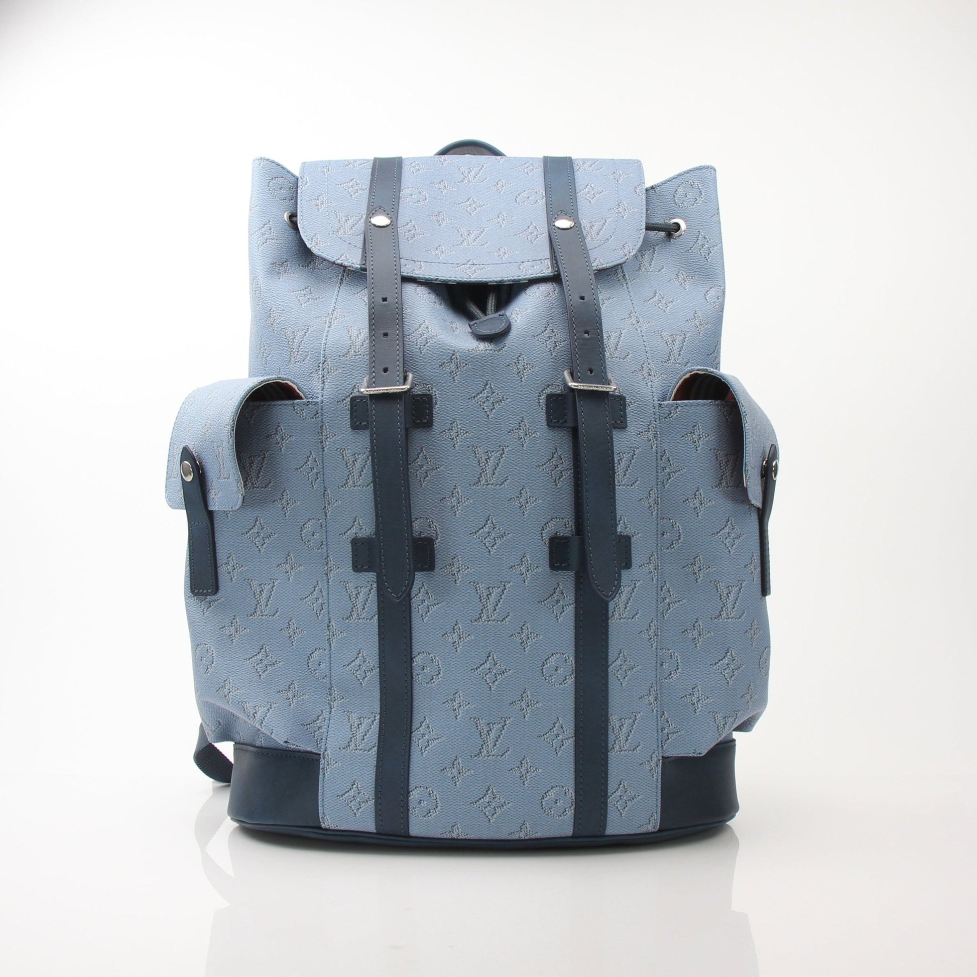 Louis Vuitton Christopher Backpack MM in monogram canvas, stylish travel bag with leather accents and adjustable straps.