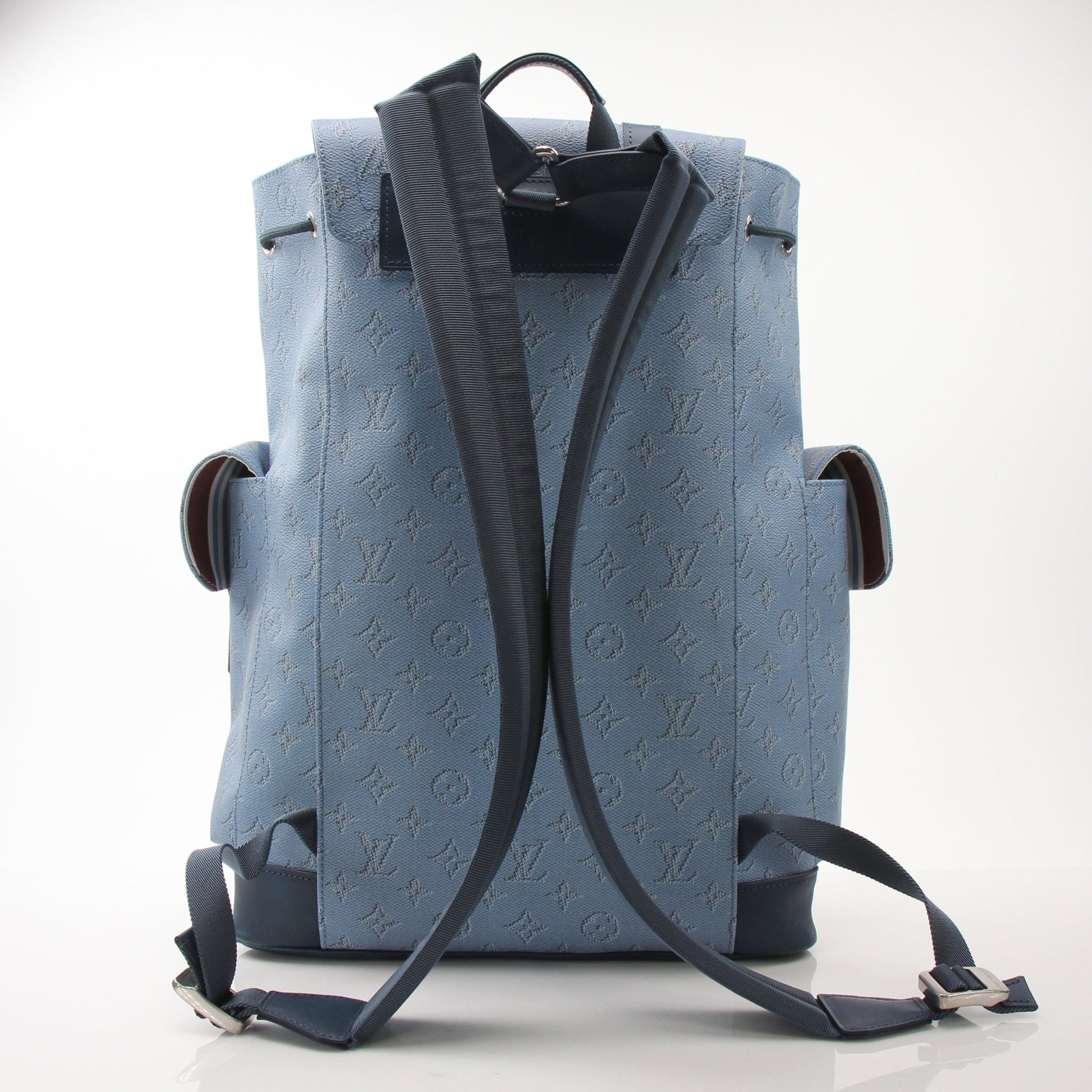 Louis Vuitton Christopher Backpack MM in leather, stylish travel bag with gold hardware and adjustable straps.