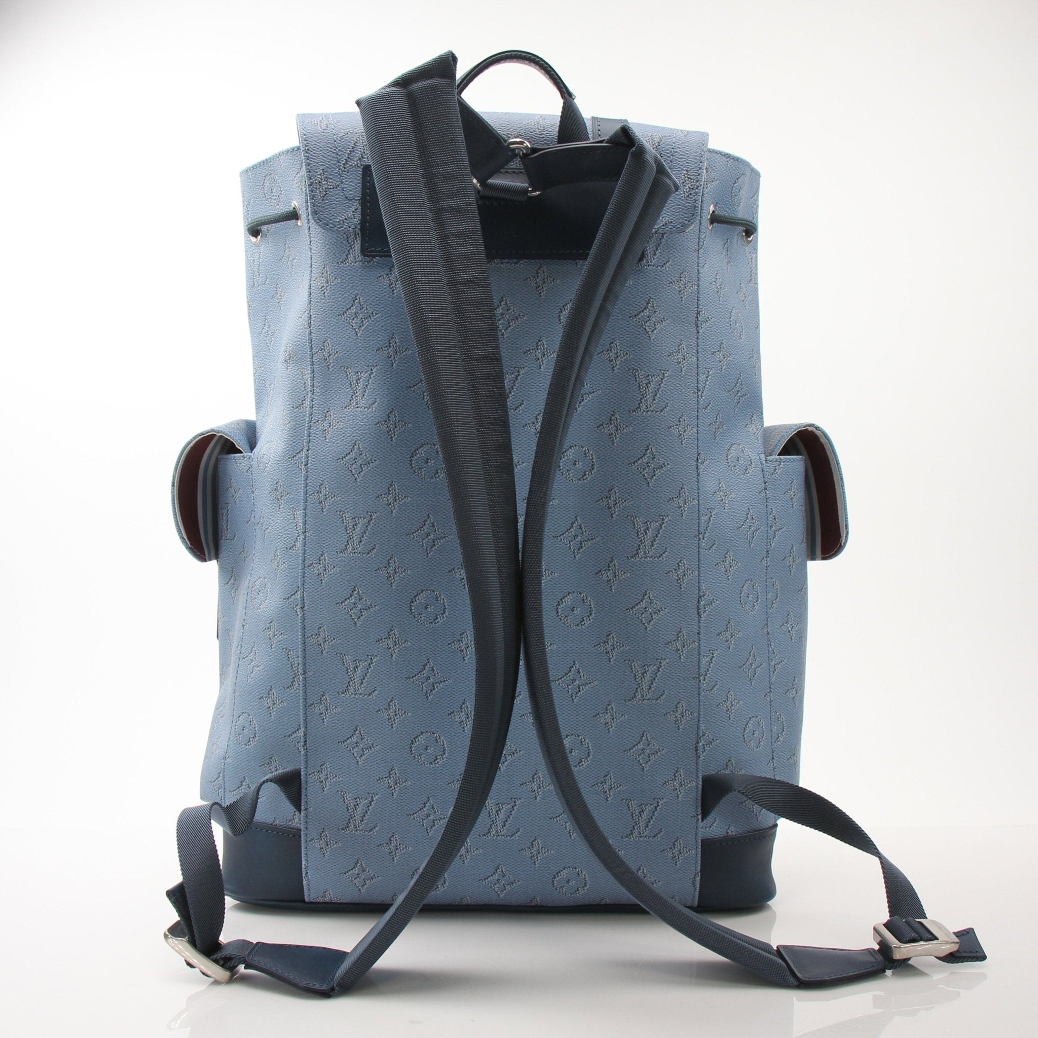 Louis Vuitton Christopher Backpack MM in leather, stylish travel bag with gold hardware and adjustable straps.